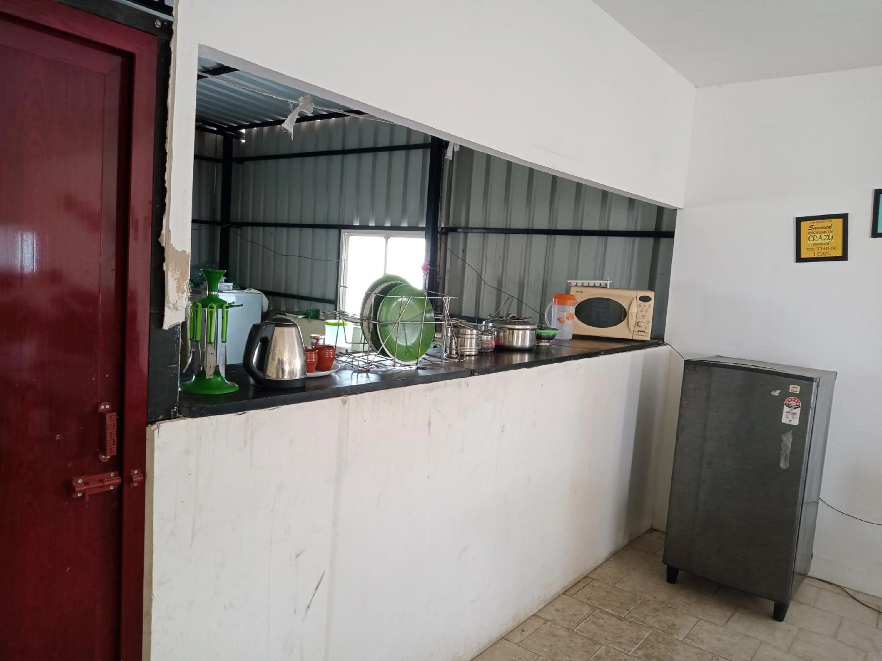 Kitchen or kitchenette in Allamanda Abode