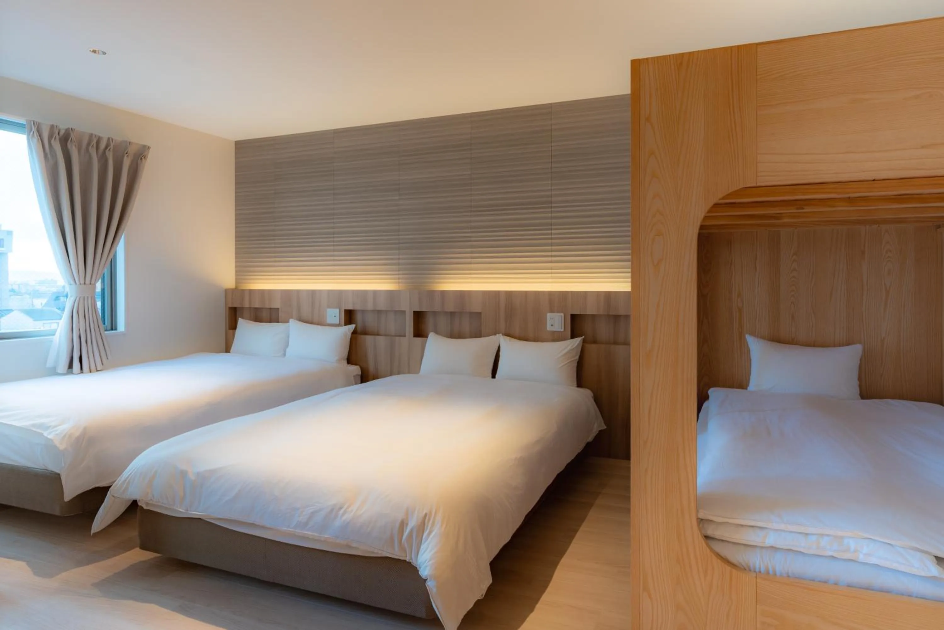 Bed in INA HOUSE Nijojo