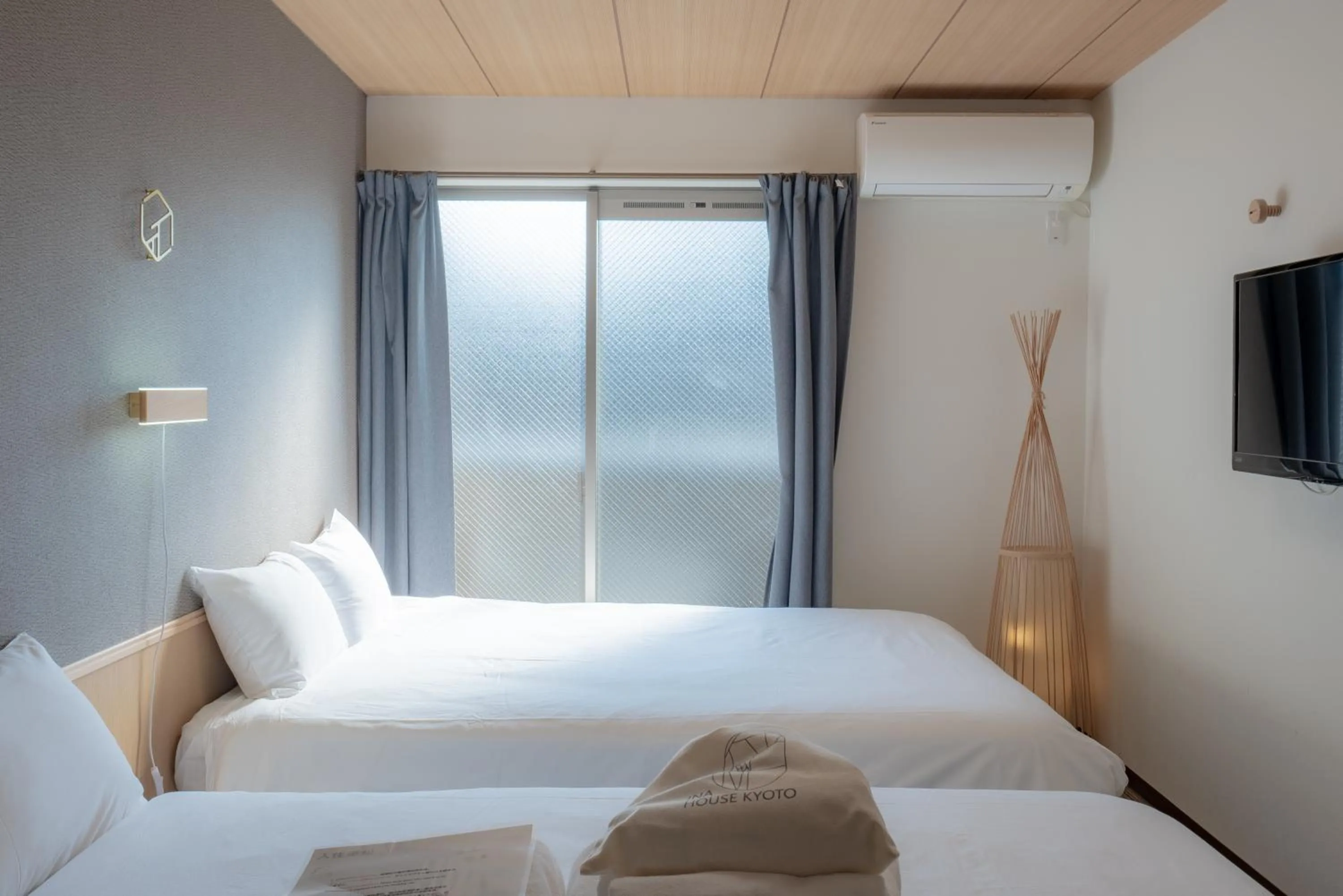 Bed in INA HOUSE Nijojo