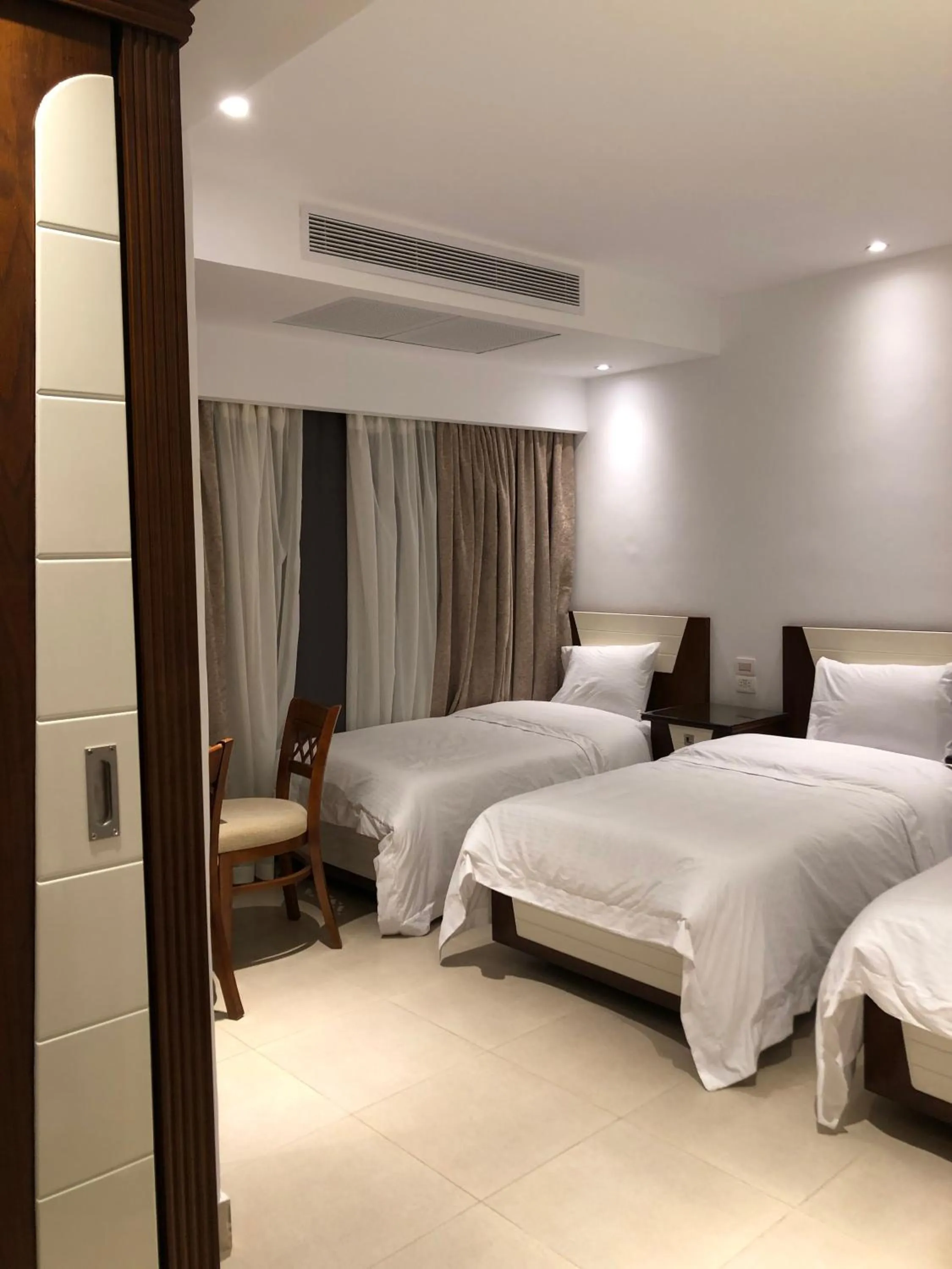 Bedroom in Maxim Hotel