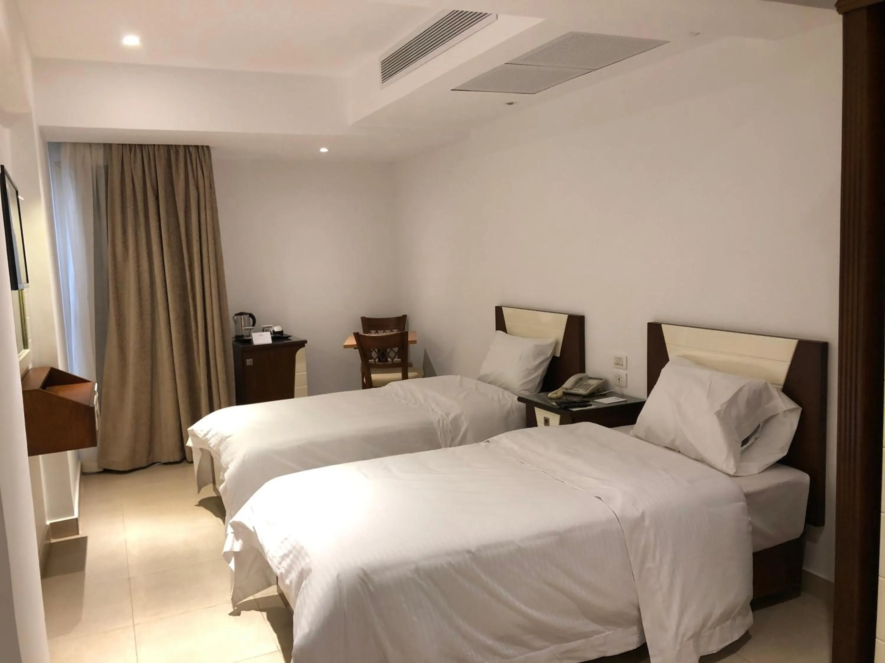 Bedroom in Maxim Hotel