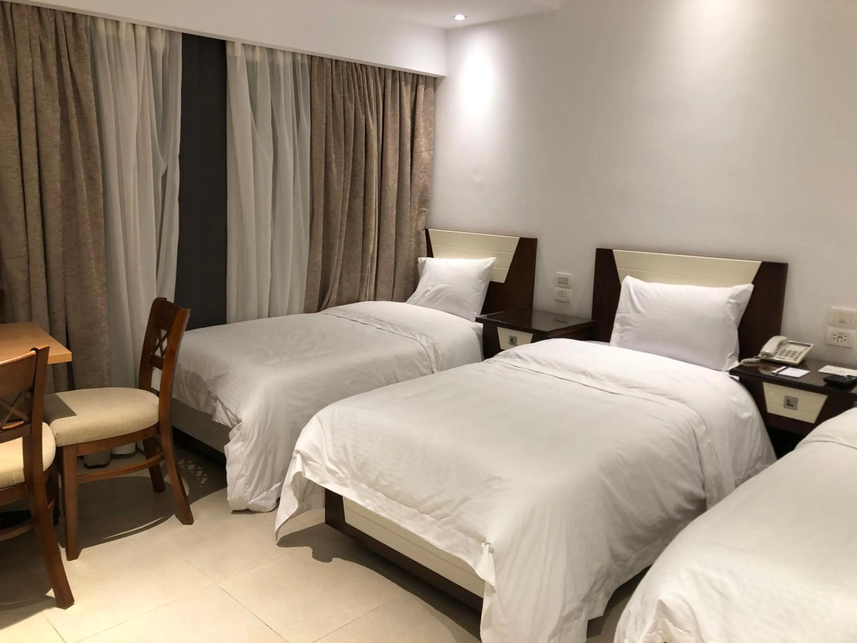 Bedroom in Maxim Hotel