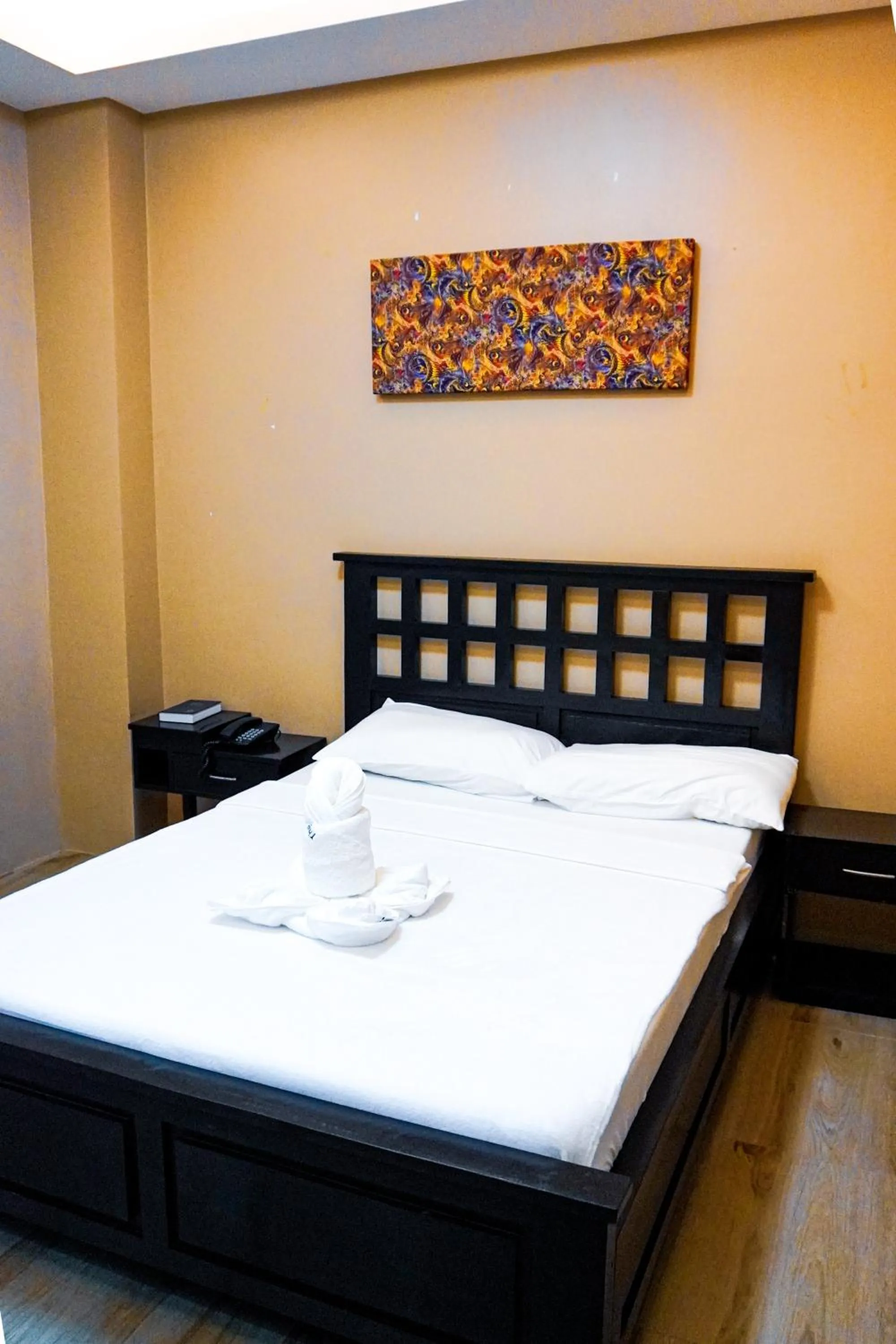 Bed in The Mang-Yan Grand Hotel powered by Cocotel