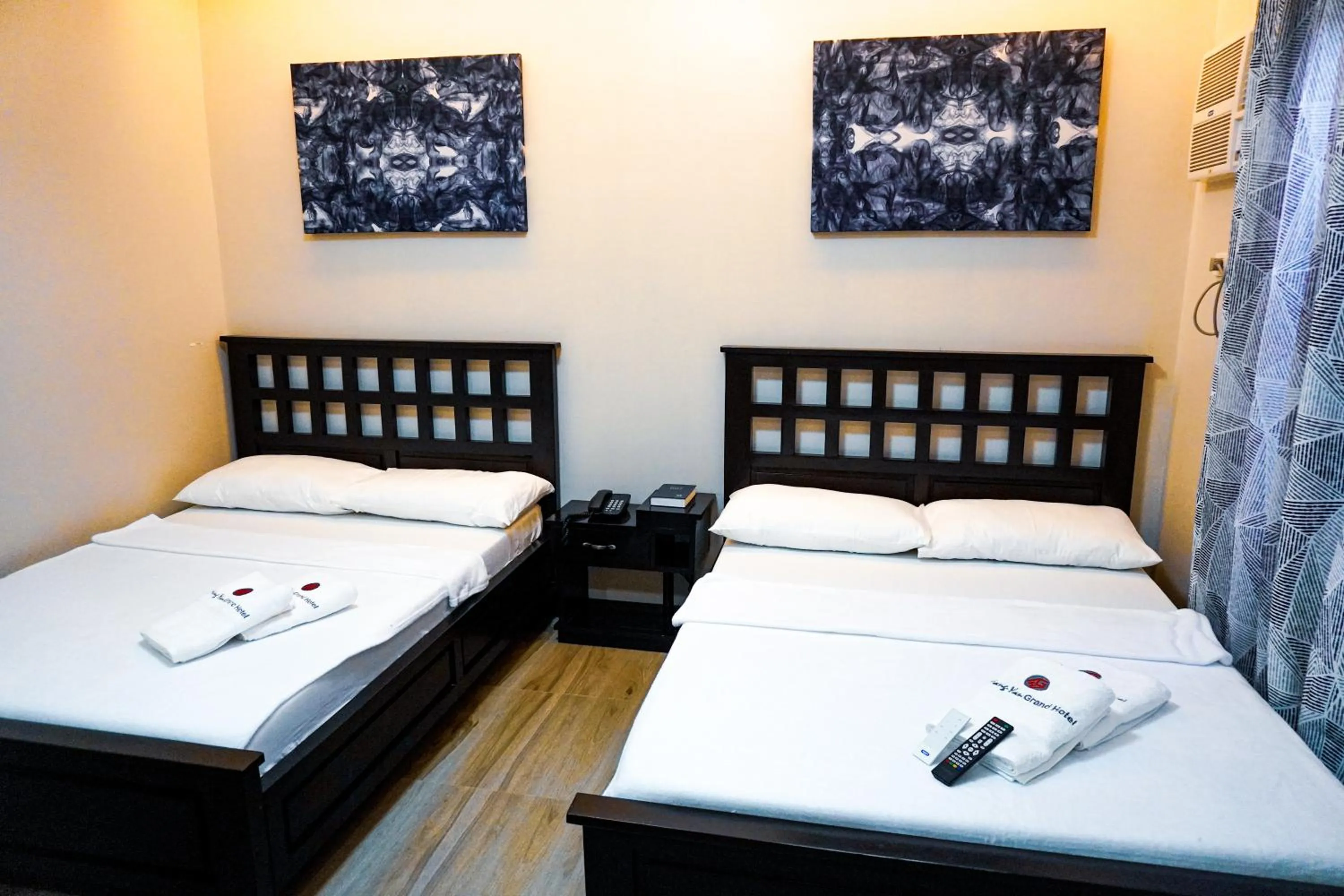 Bed in The Mang-Yan Grand Hotel powered by Cocotel