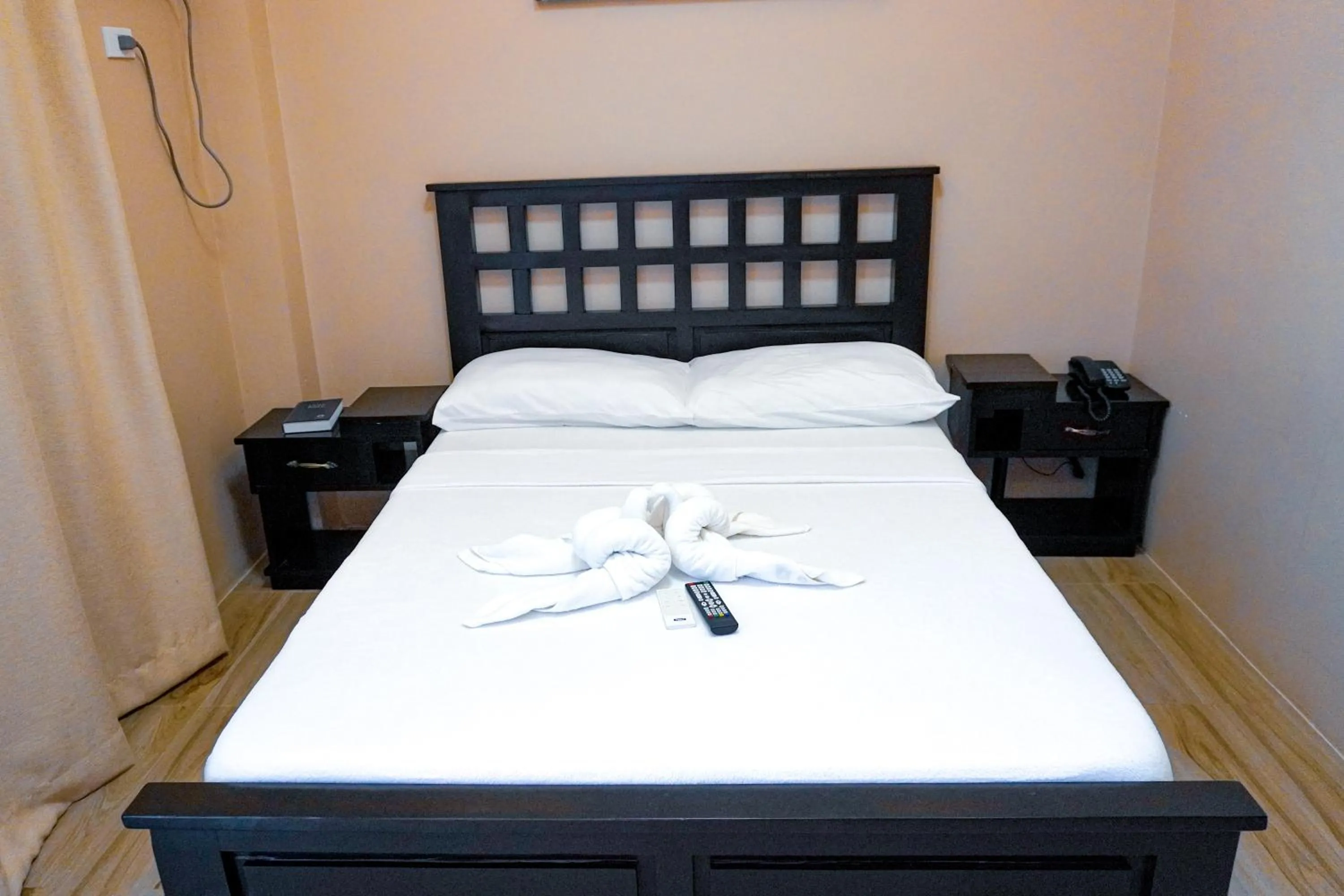 Bed in The Mang-Yan Grand Hotel powered by Cocotel