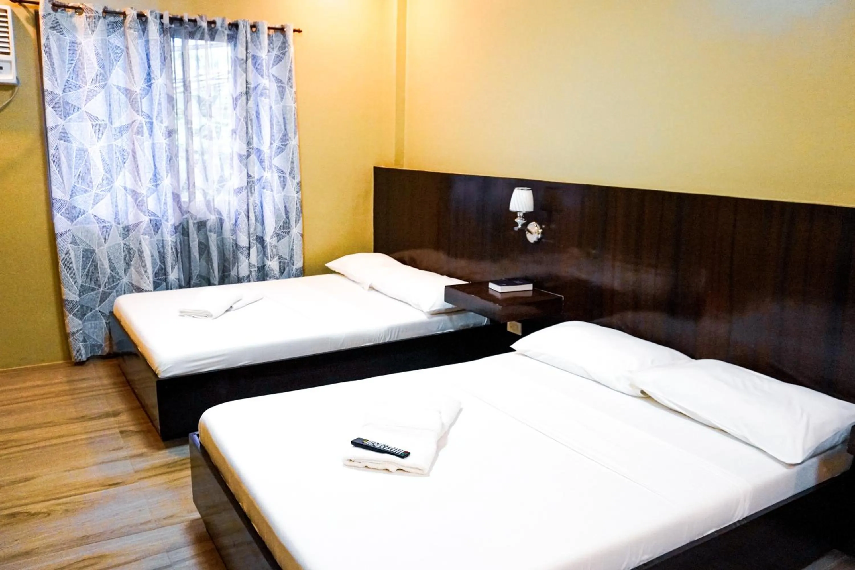 Bed in The Mang-Yan Grand Hotel powered by Cocotel