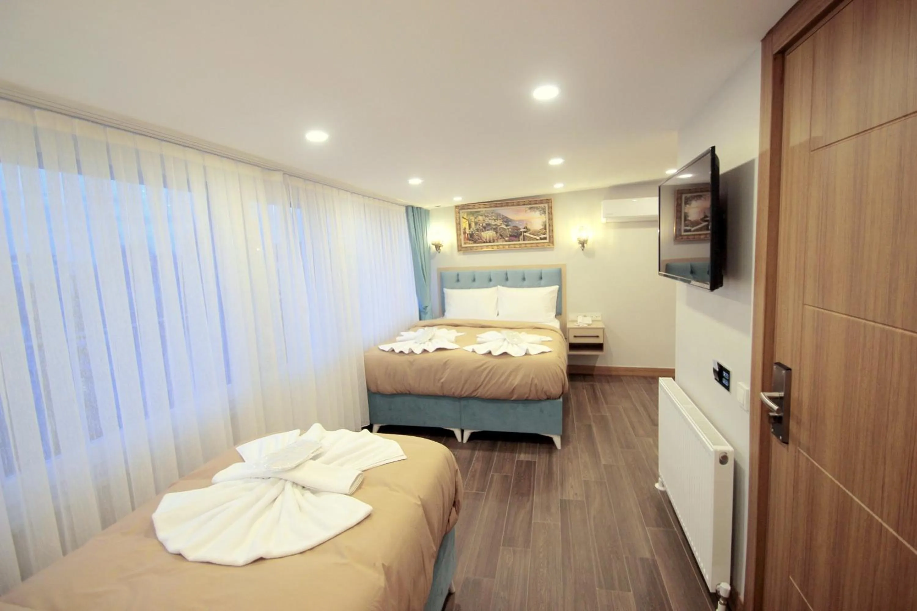 Photo of the whole room, Bed in Hira Hotel