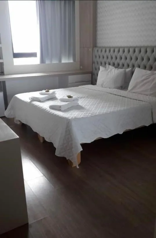 Bed in POUSADA DA NANA