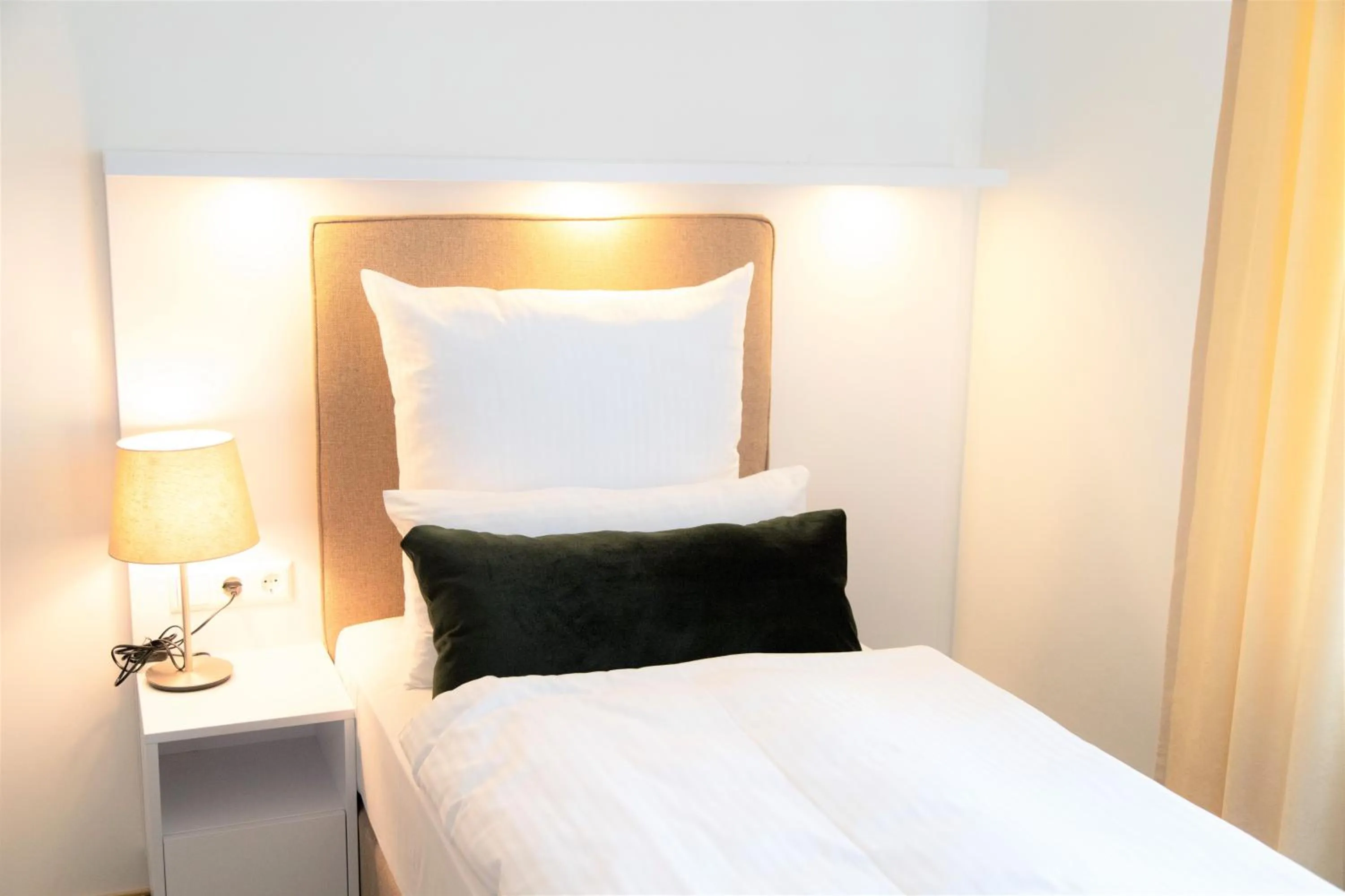 Bed in Amplidi Hotel Hannover