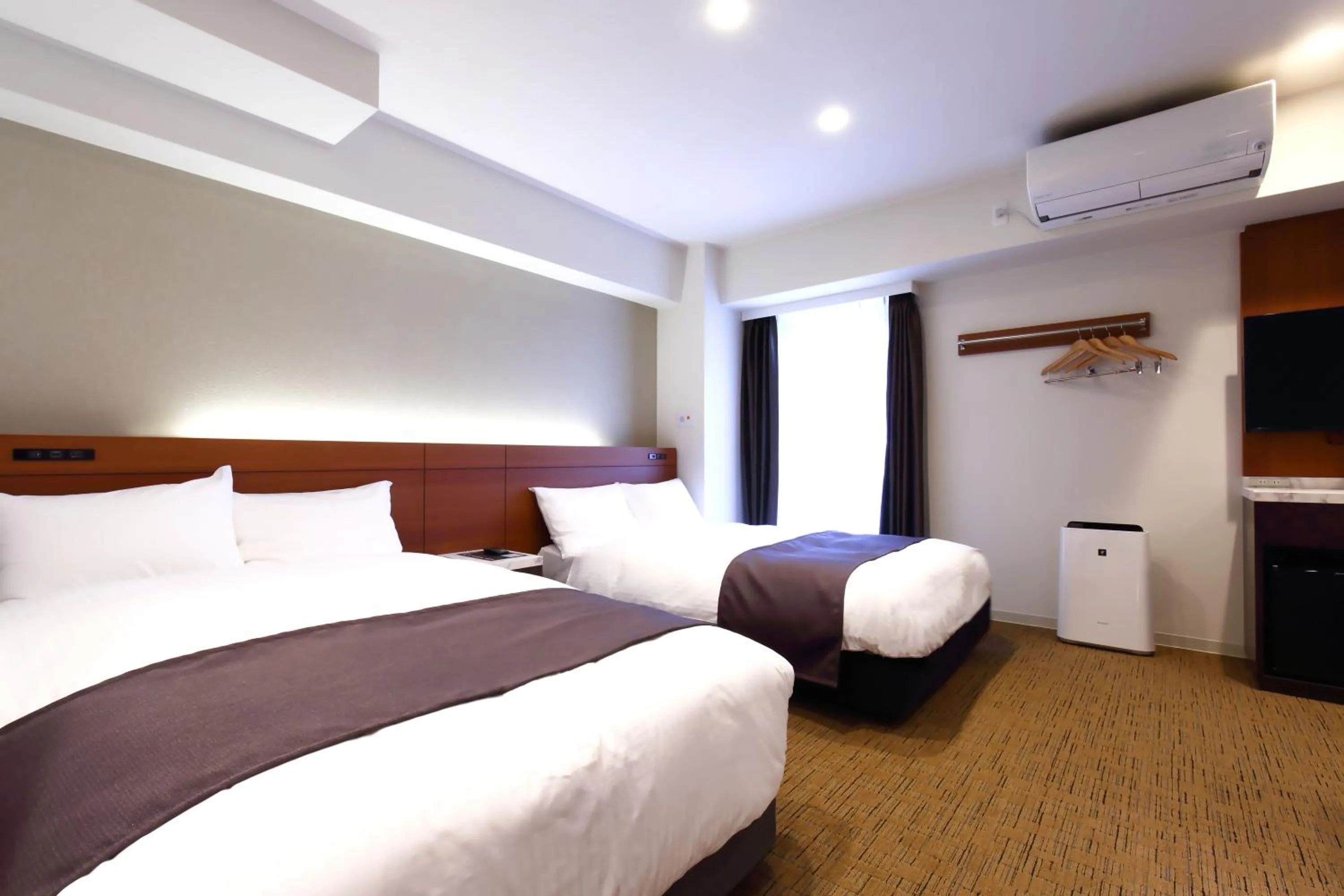 Photo of the whole room, Bed in LUXCARE HOTEL