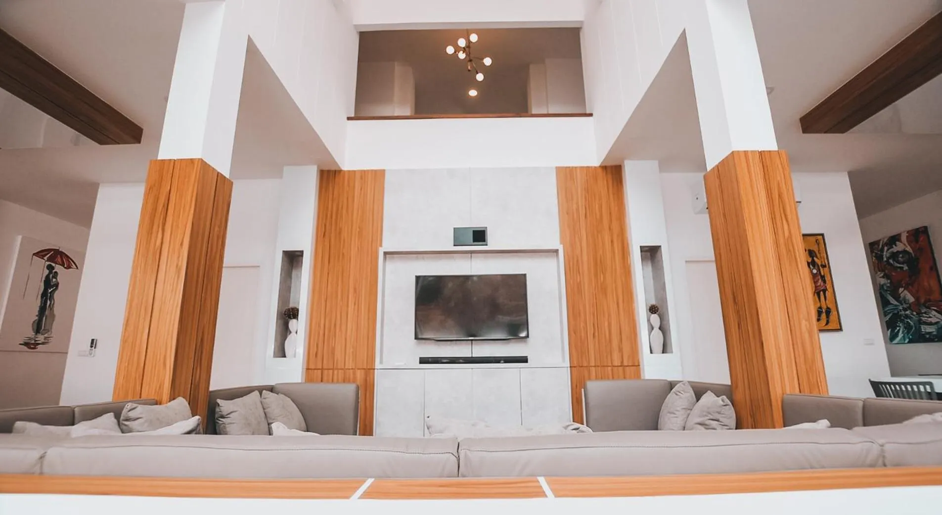 Communal lounge/ TV room in Happy Family Villa