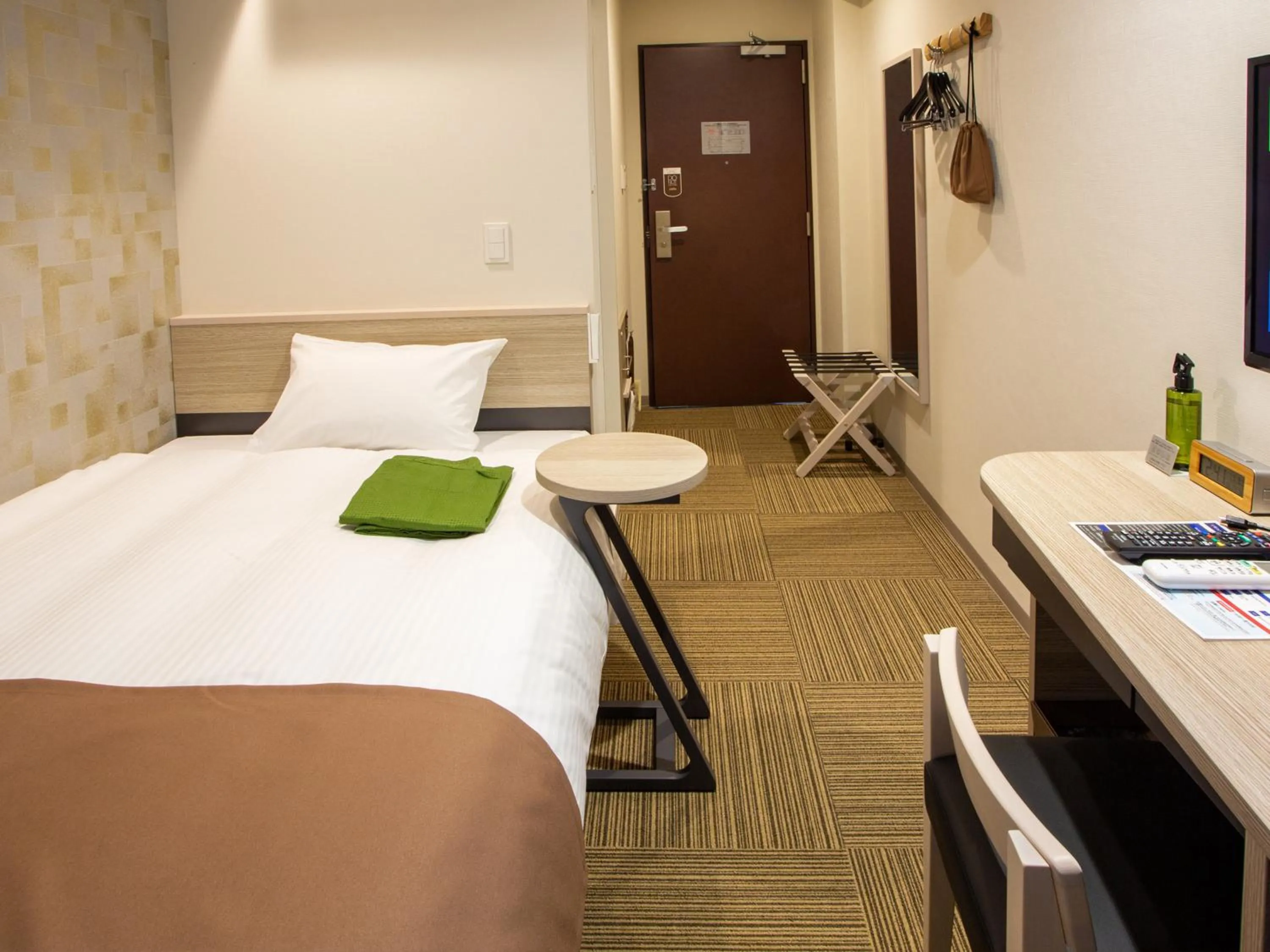 Bed in Kuretake Inn Ogaki Ekimae