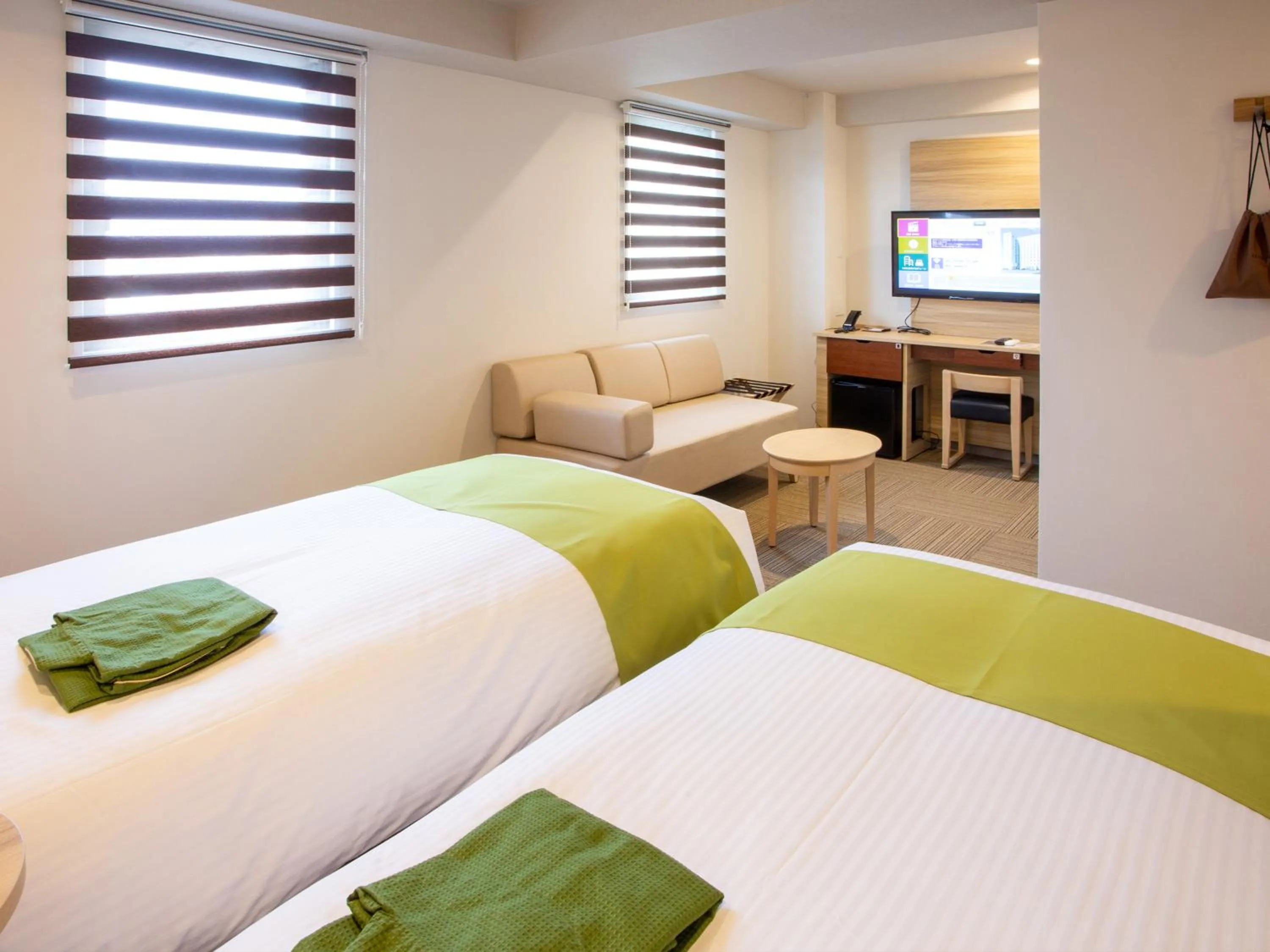 Bed in Kuretake Inn Ogaki Ekimae