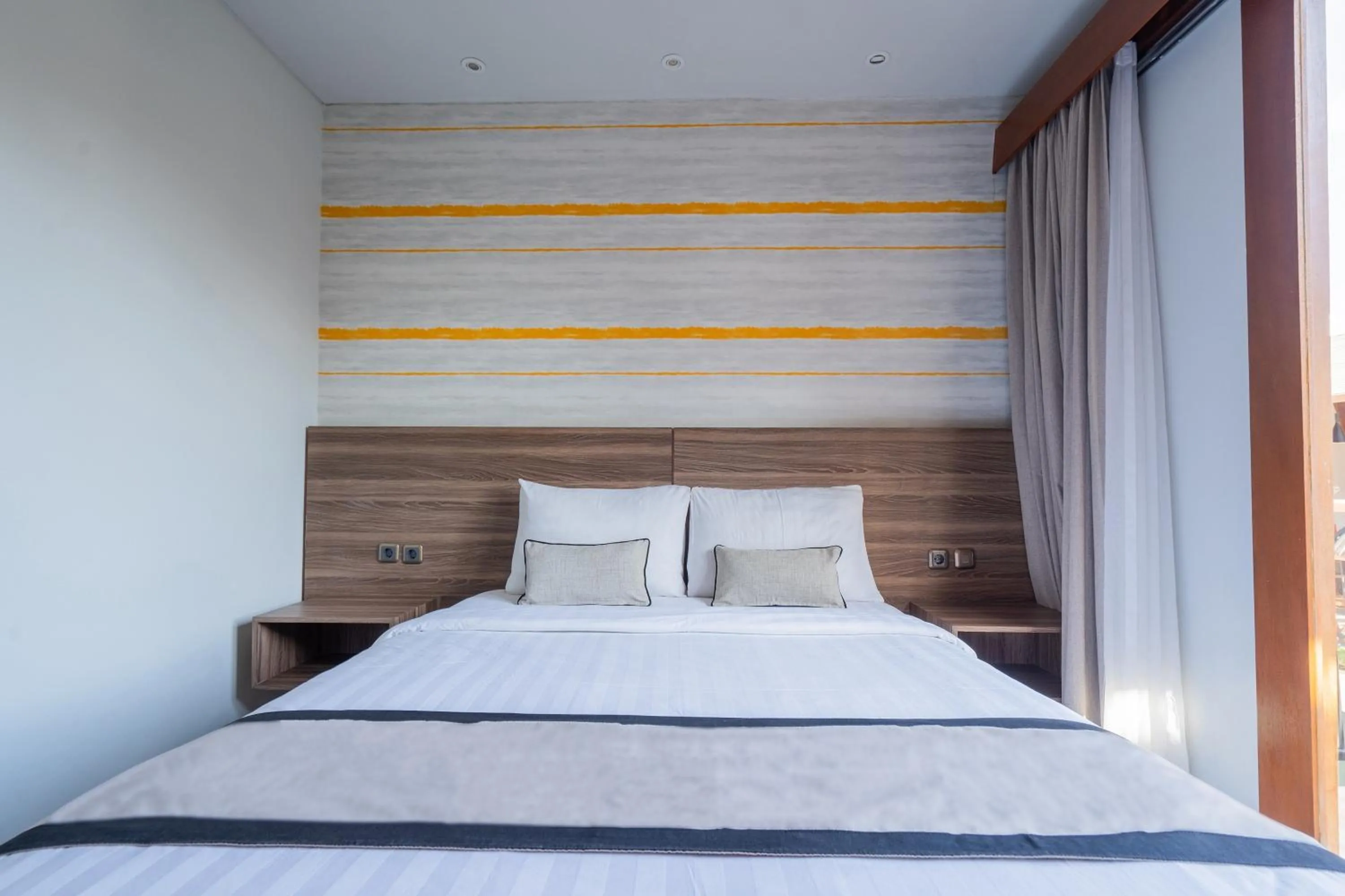 Bed in Mahesa Suites Seminyak