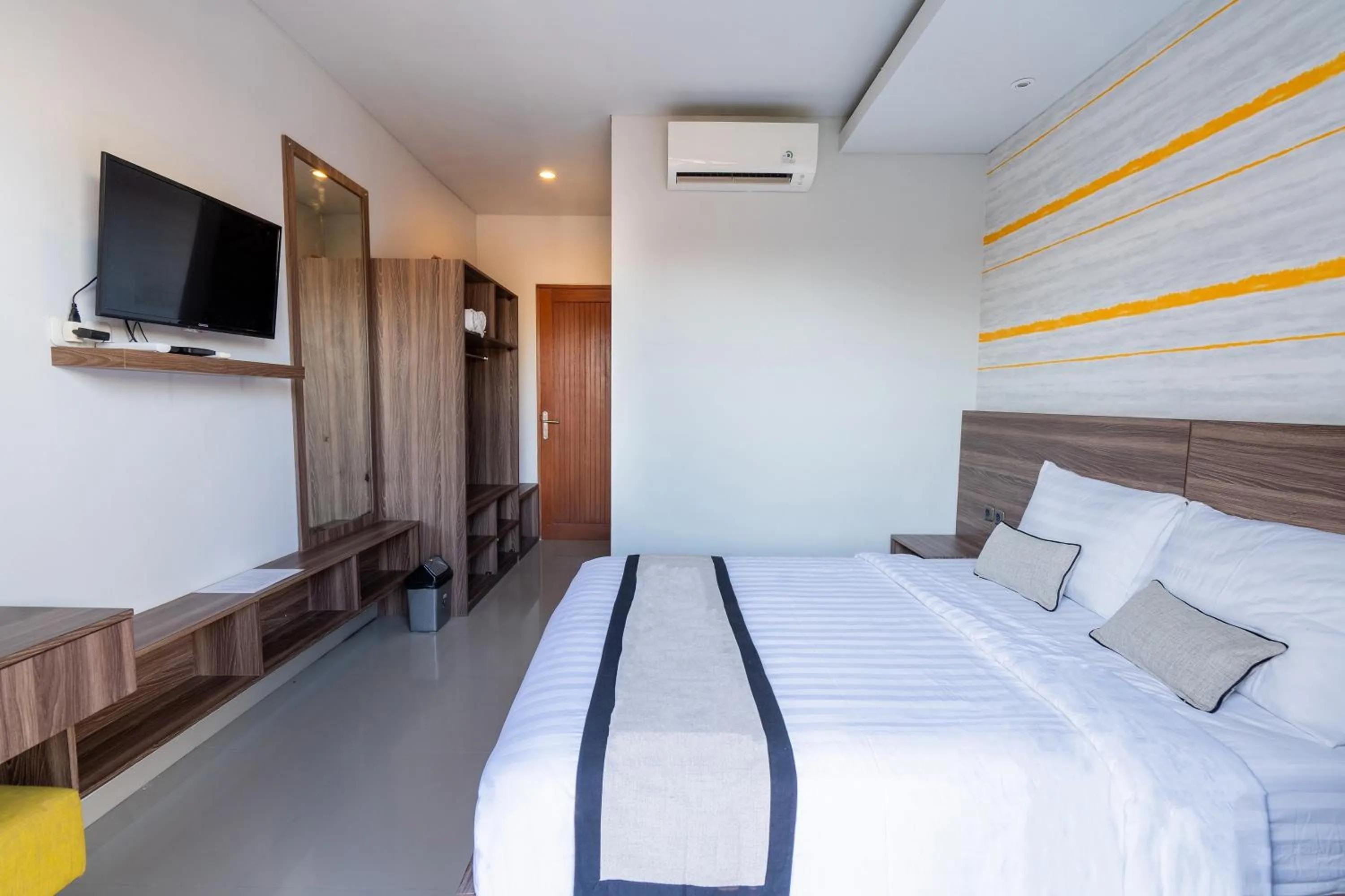 Bed in Mahesa Suites Seminyak