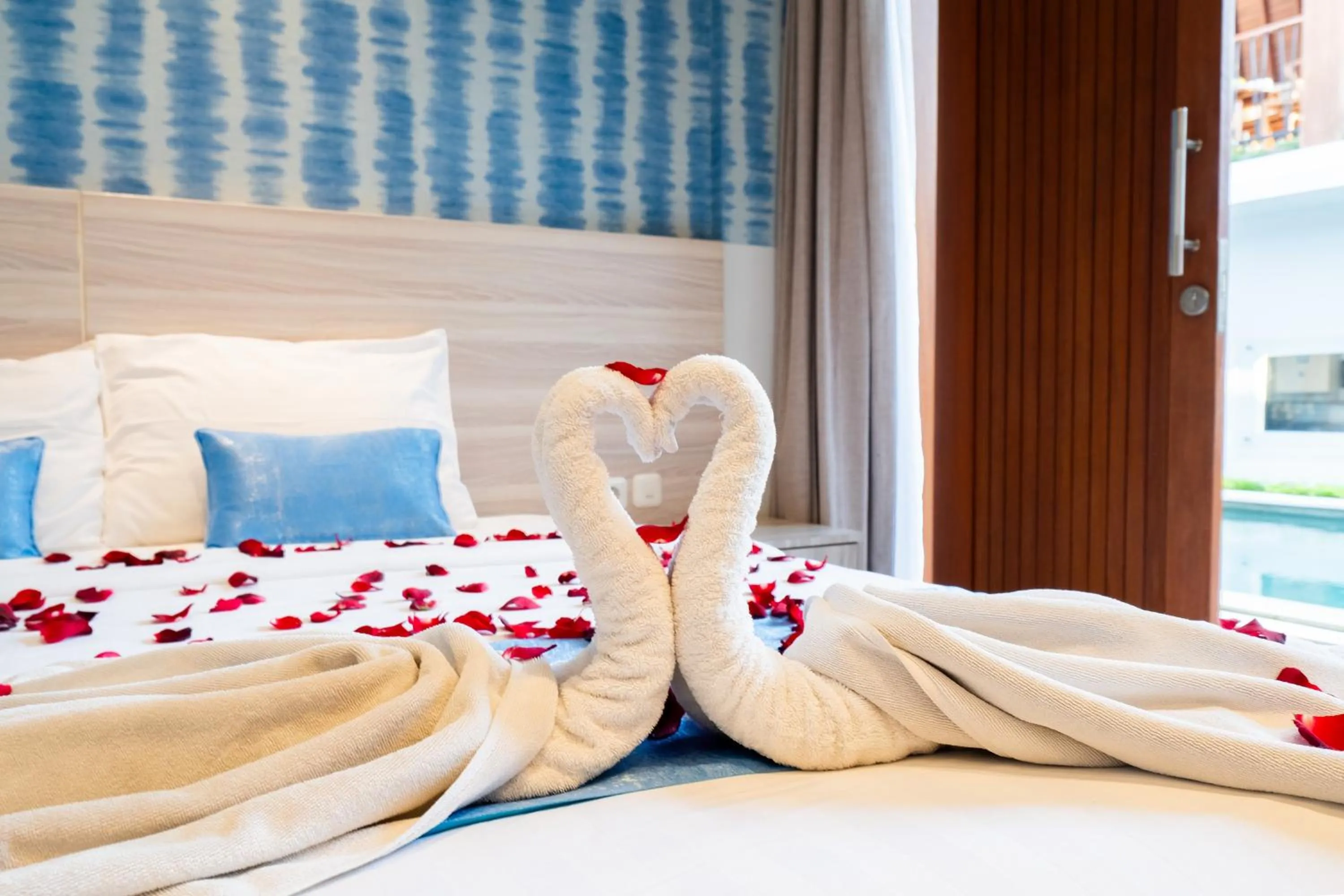 Bed in Mahesa Suites Seminyak