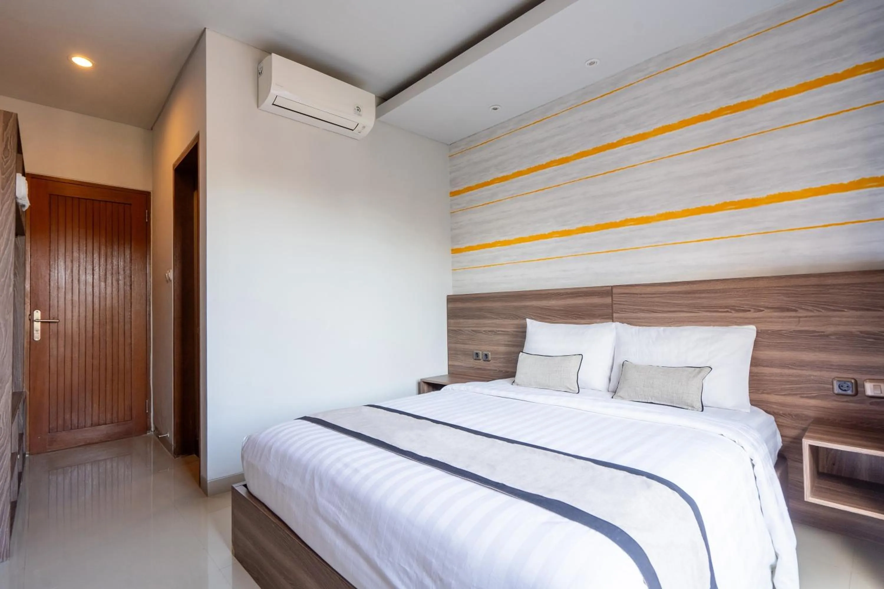 Bed in Mahesa Suites Seminyak