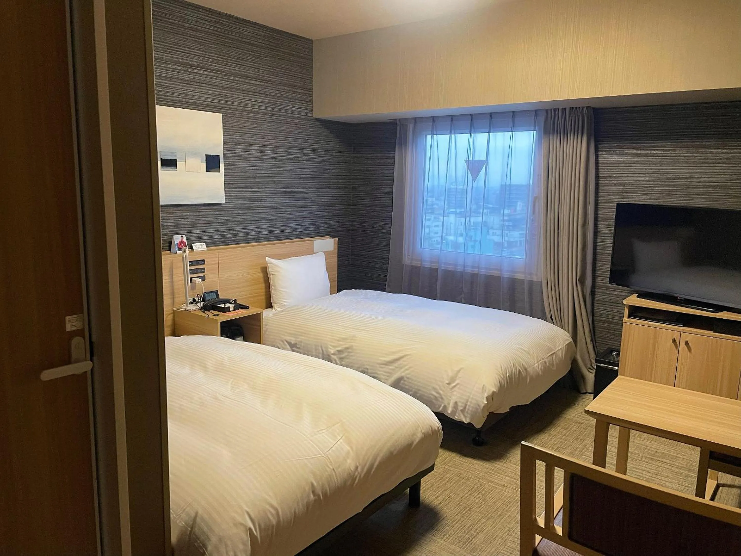 Photo of the whole room, Bed in Hotel Route-Inn Sakurai Ekimae