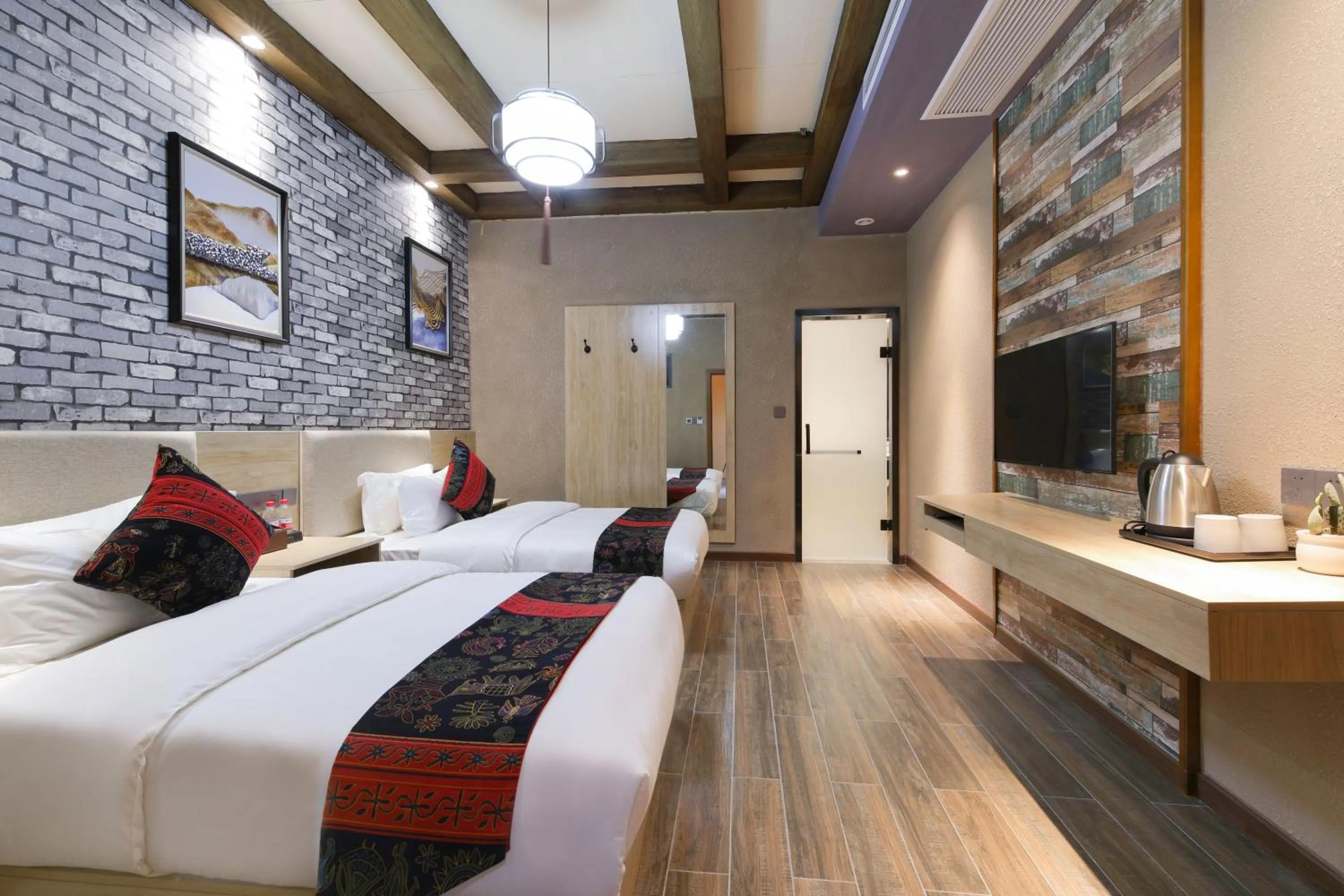 Bed in Zou Qu Ye Travel Hotel