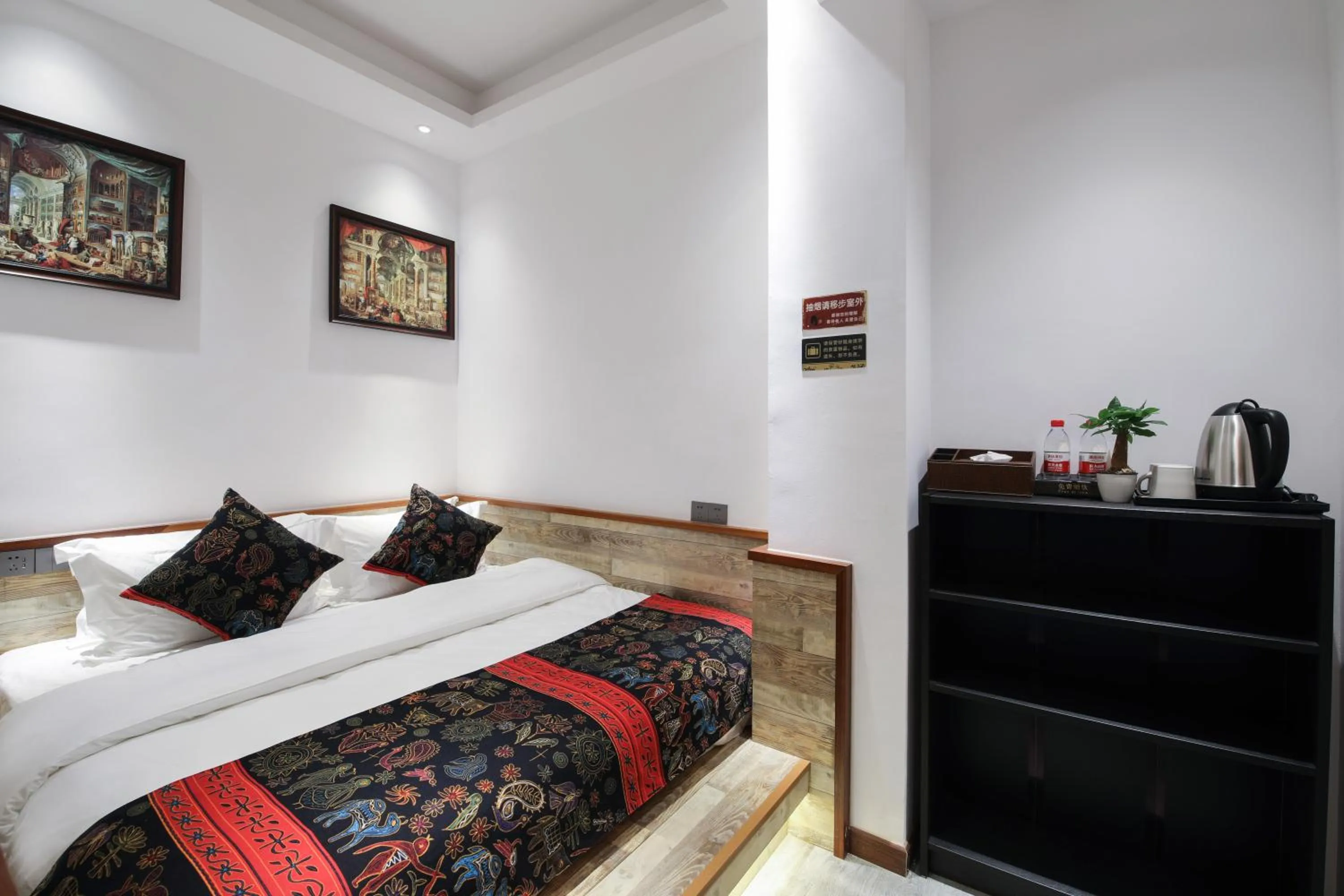 Bed in Zou Qu Ye Travel Hotel