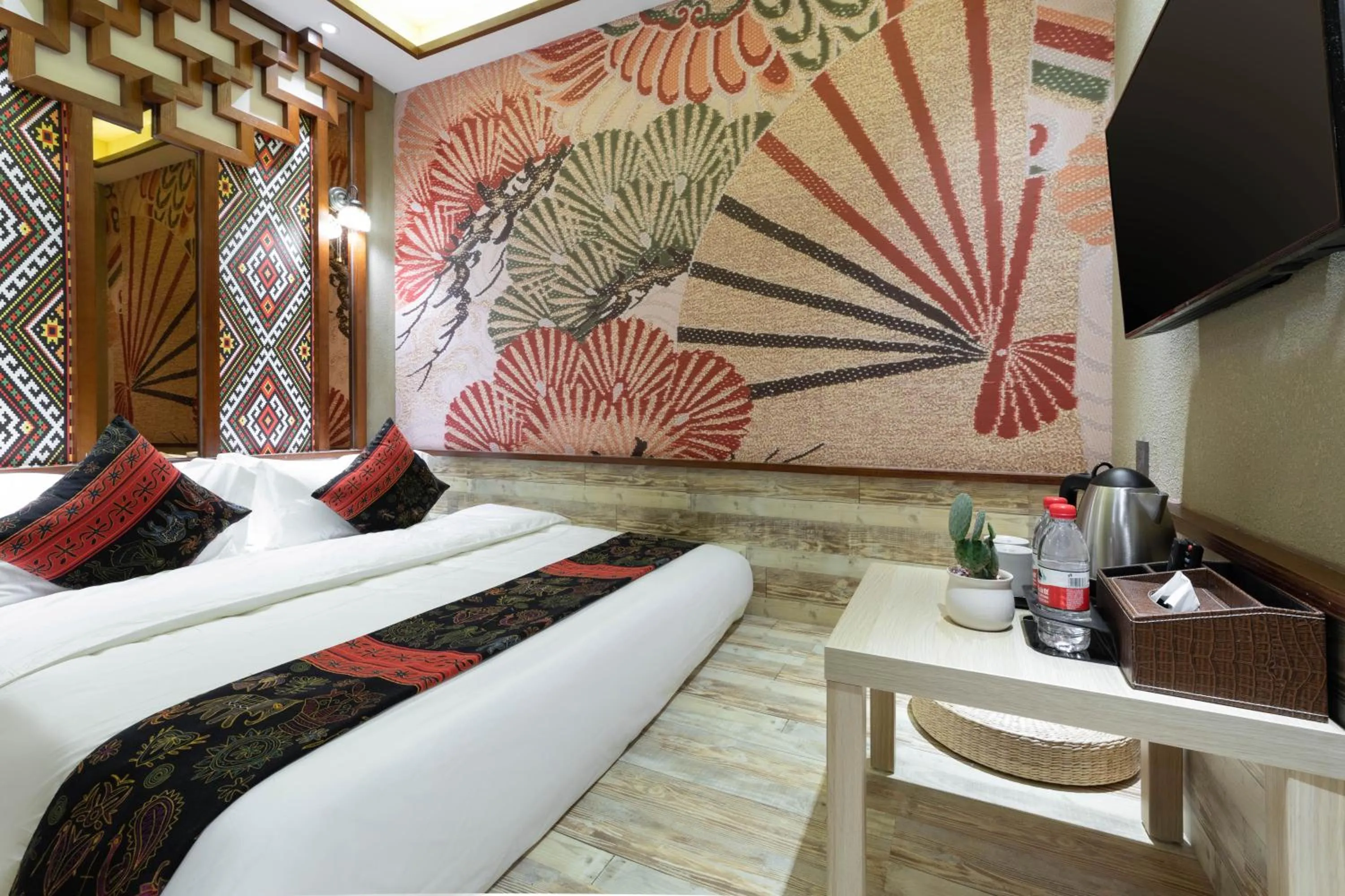 Bed in Zou Qu Ye Travel Hotel