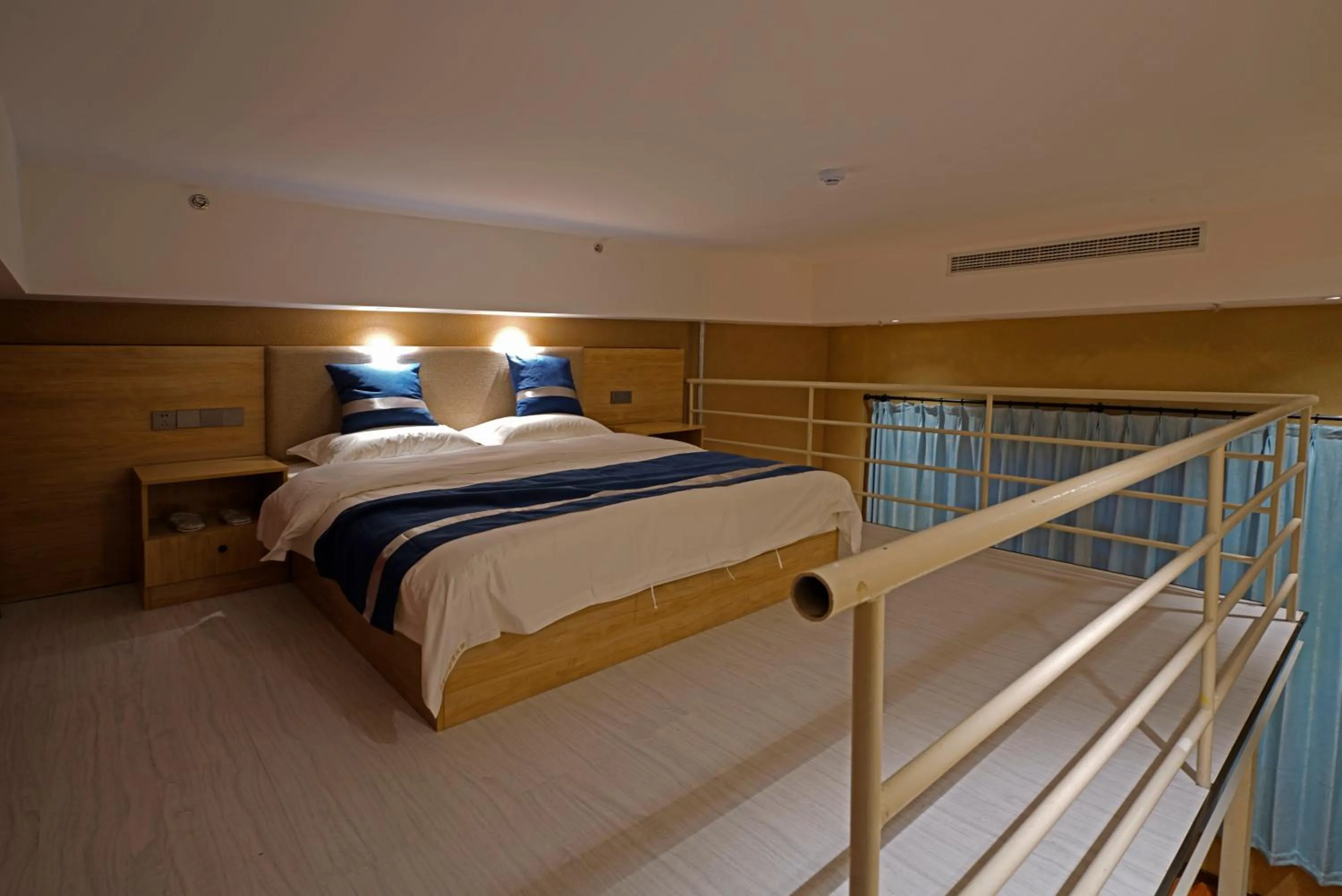 Bed in Zou Qu Ye Travel Hotel