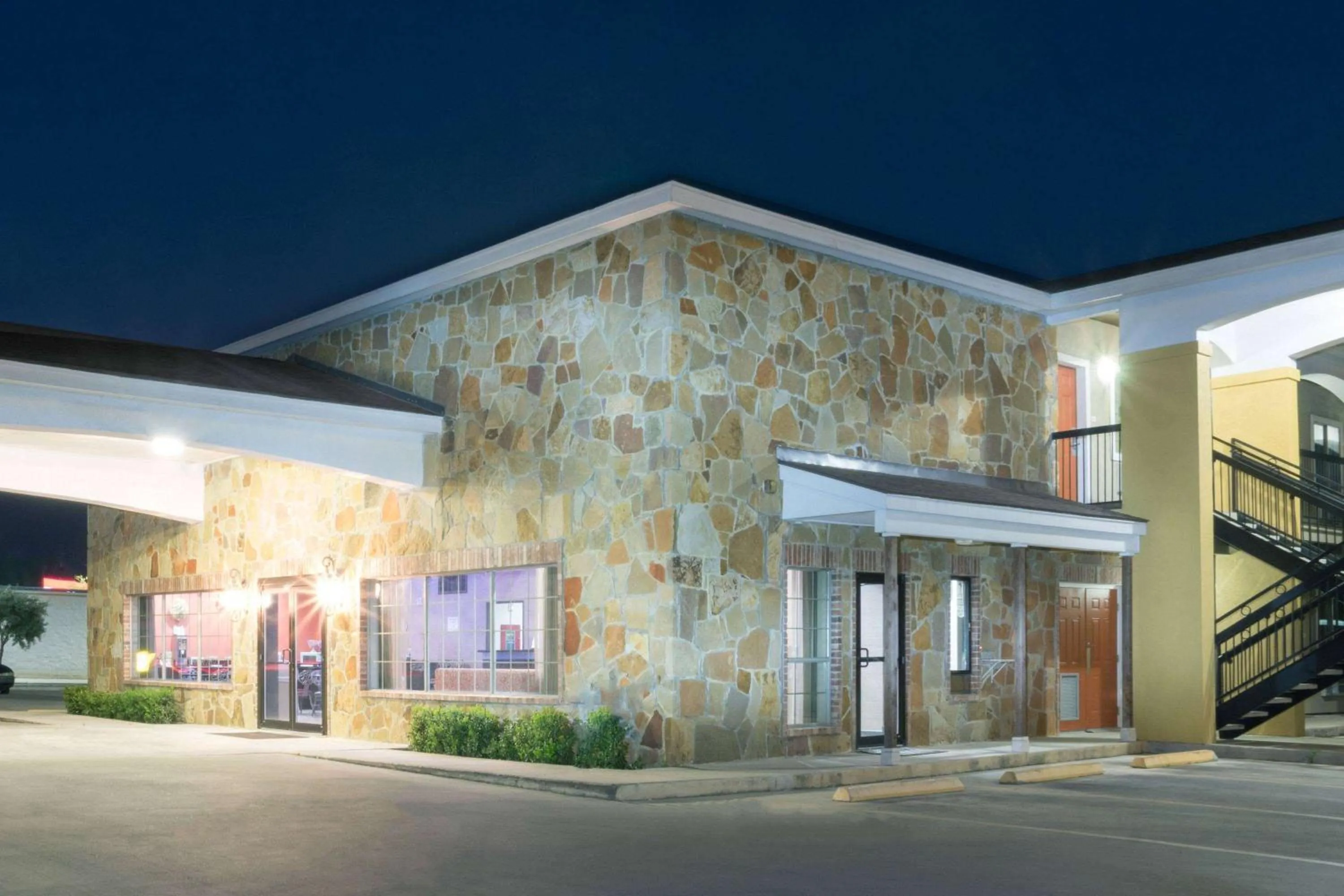 Property building in Super 8 by Wyndham San Antonio Near Fort Sam Houston