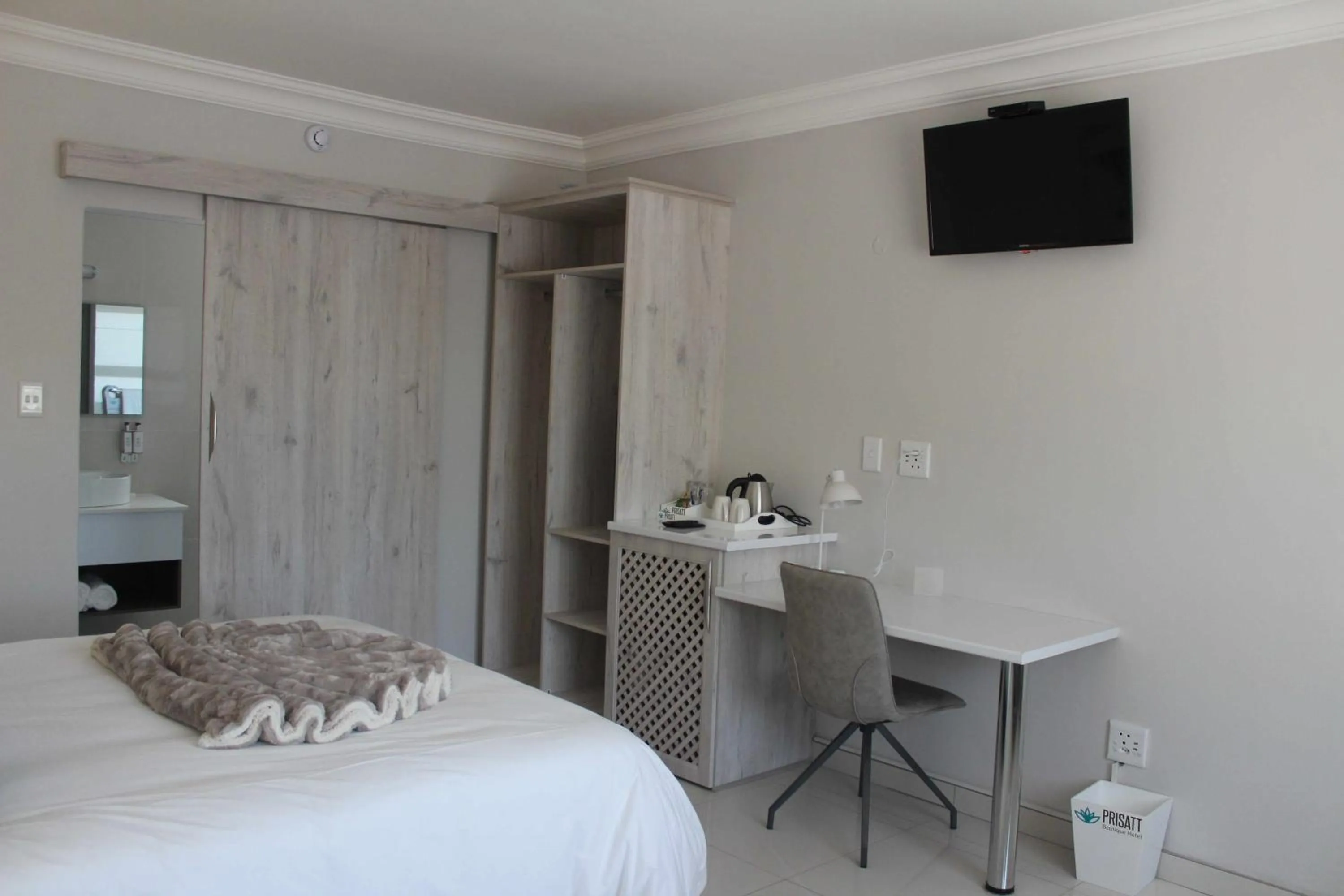 Bed in Prisatt Boutique Hotel