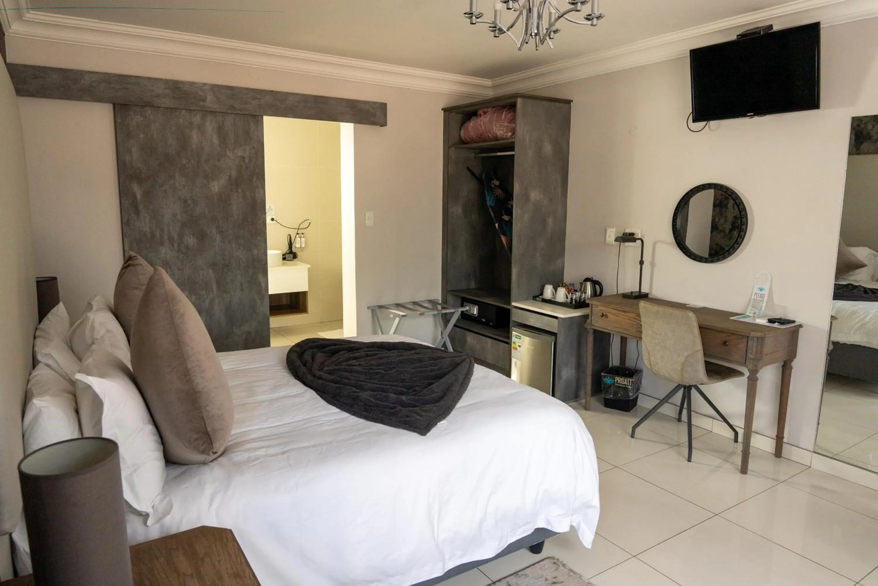 Bed in Prisatt Boutique Hotel