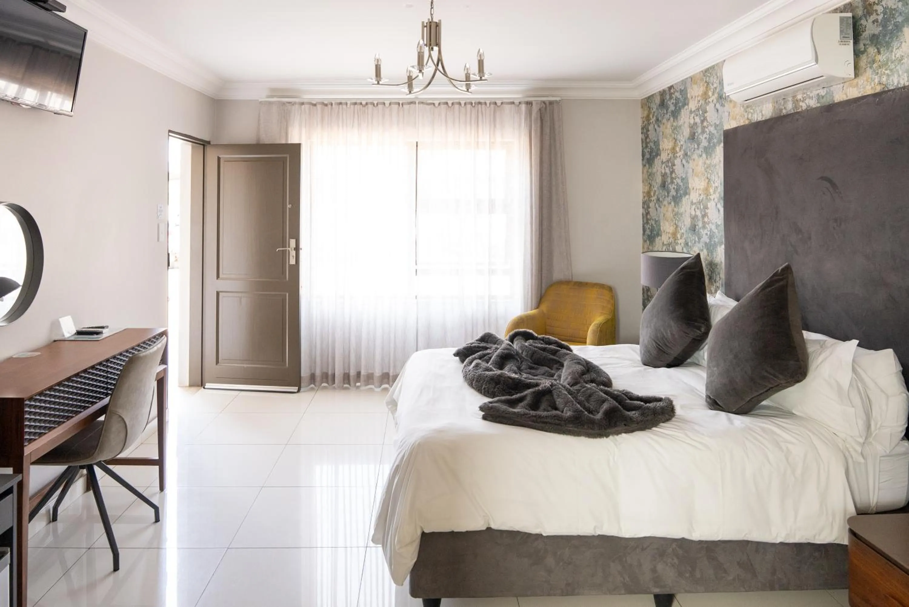 Bed in Prisatt Boutique Hotel