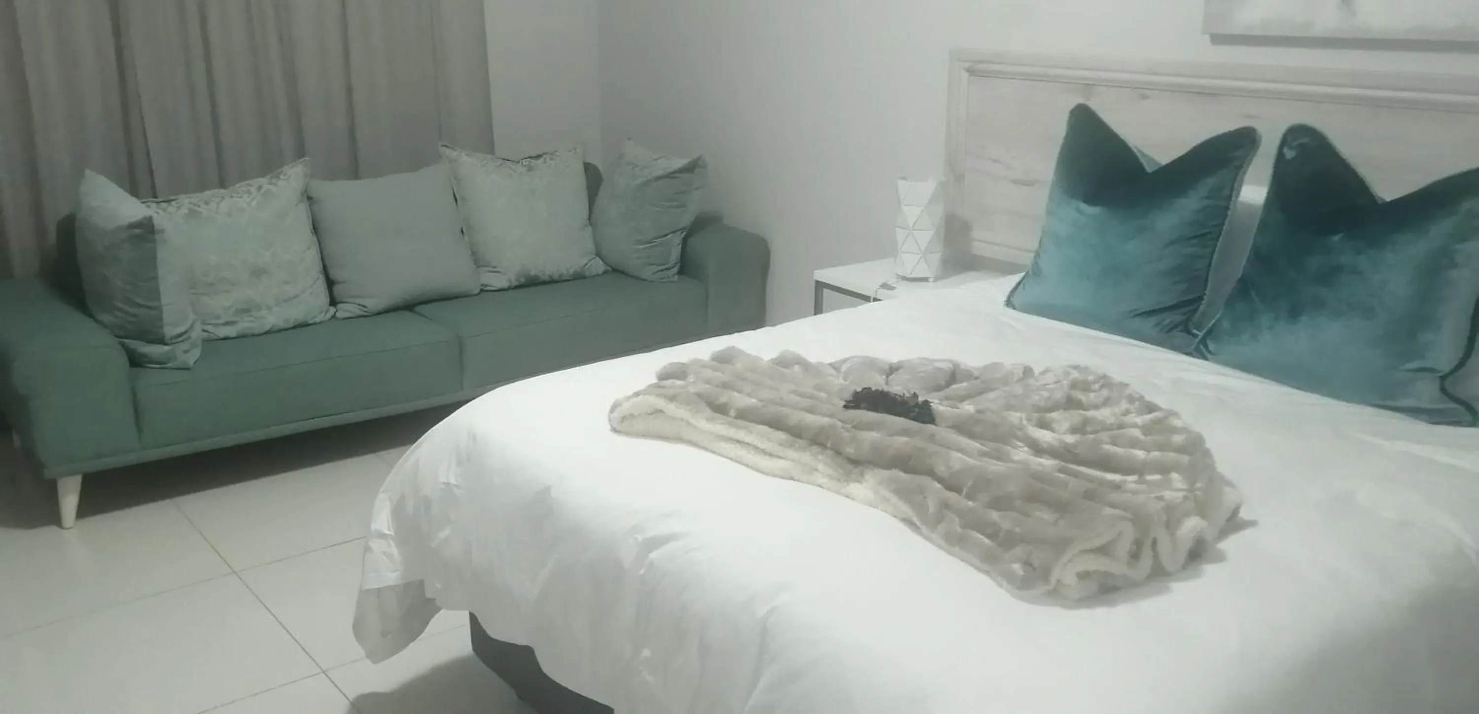 Bed in Prisatt Boutique Hotel