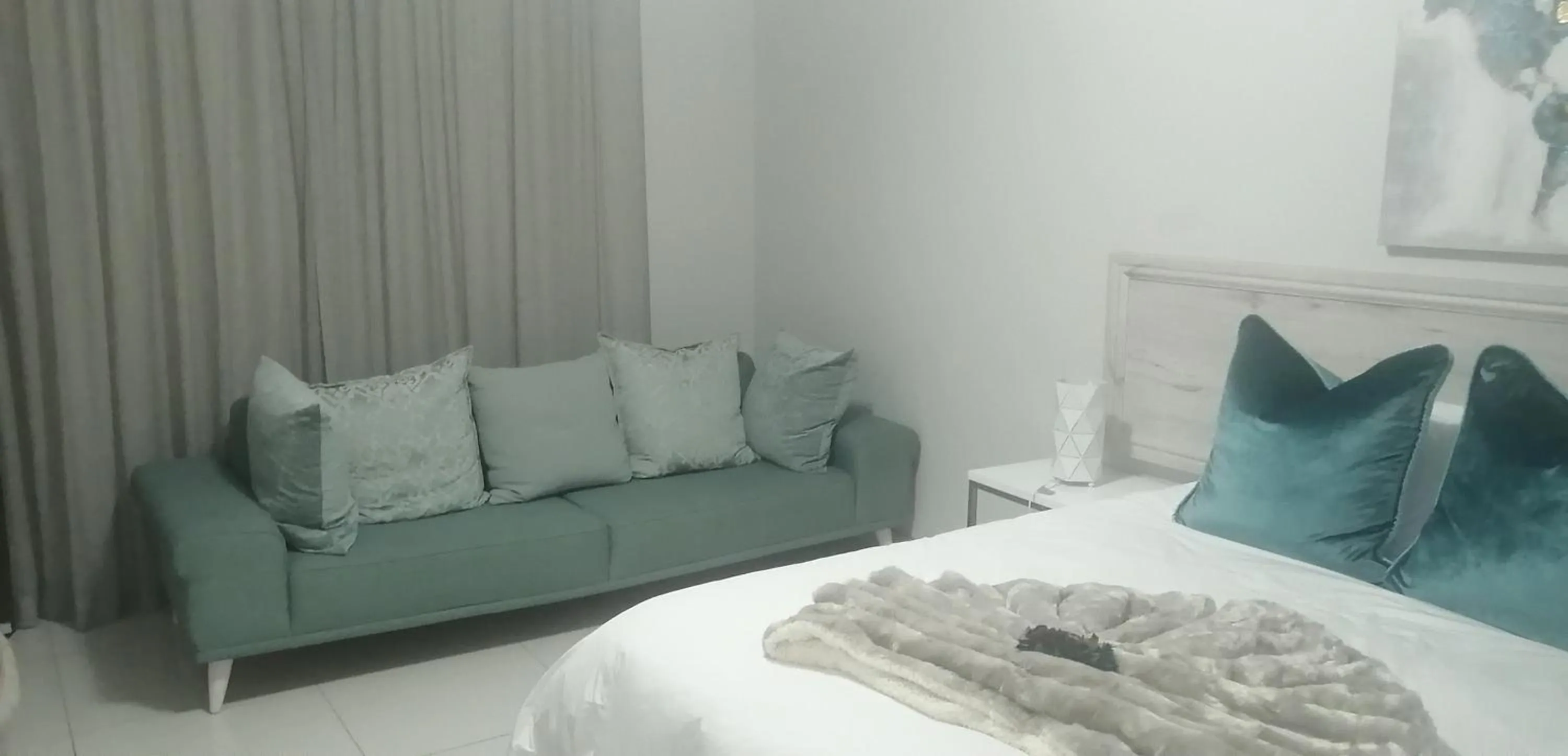 Bed in Prisatt Boutique Hotel