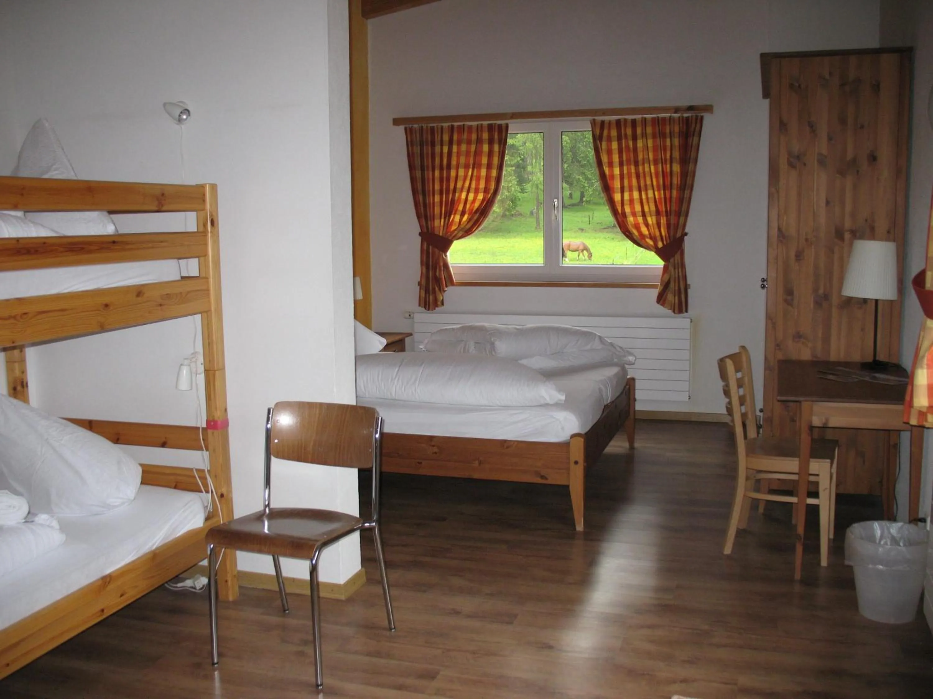 Photo of the whole room, Bed in Reitstall und Saloon San Jon