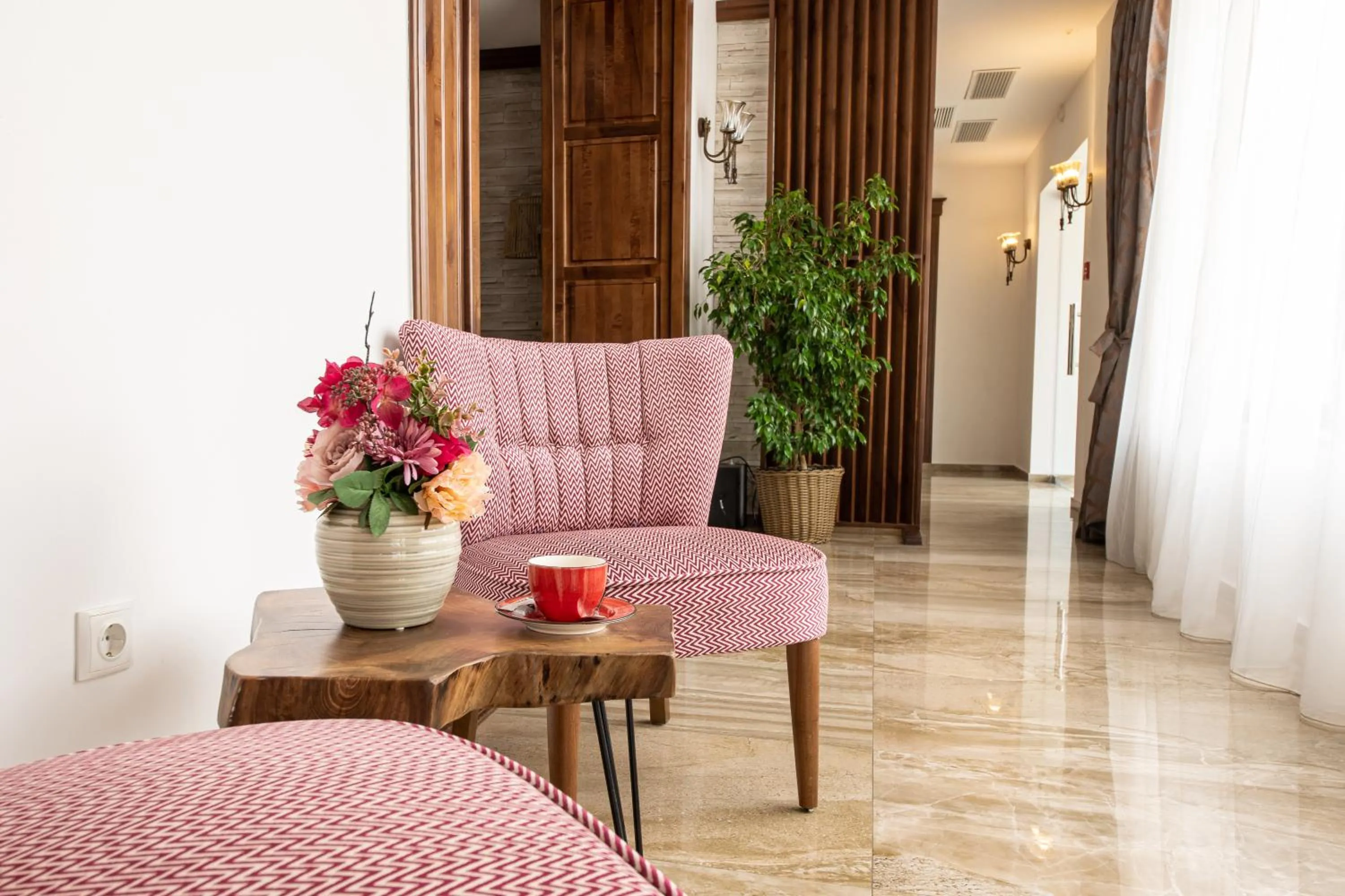 Seating area in RED CONFORT HOTEL Boutique