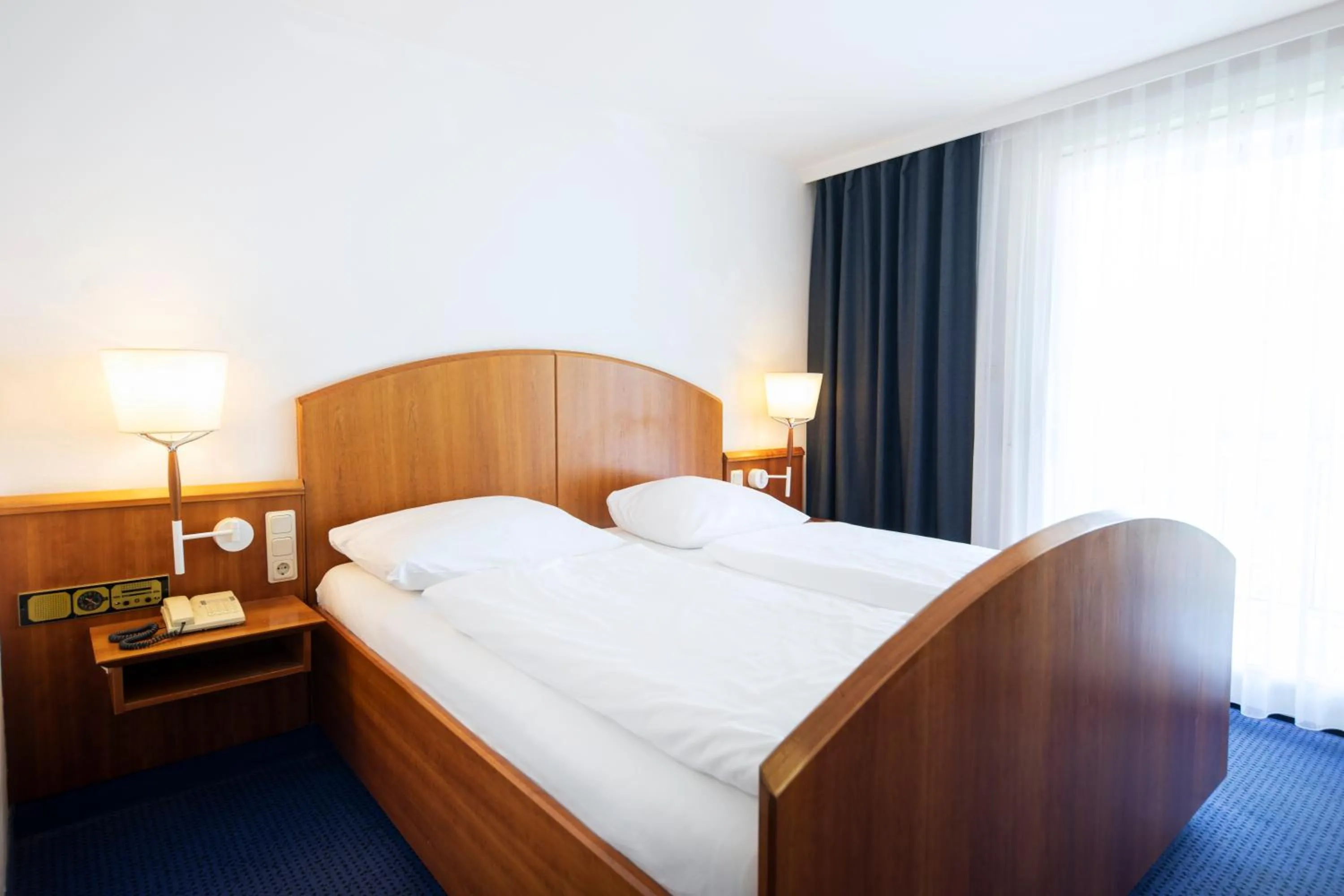 Bedroom, Bed in Karoli Hotel Waldkirchen