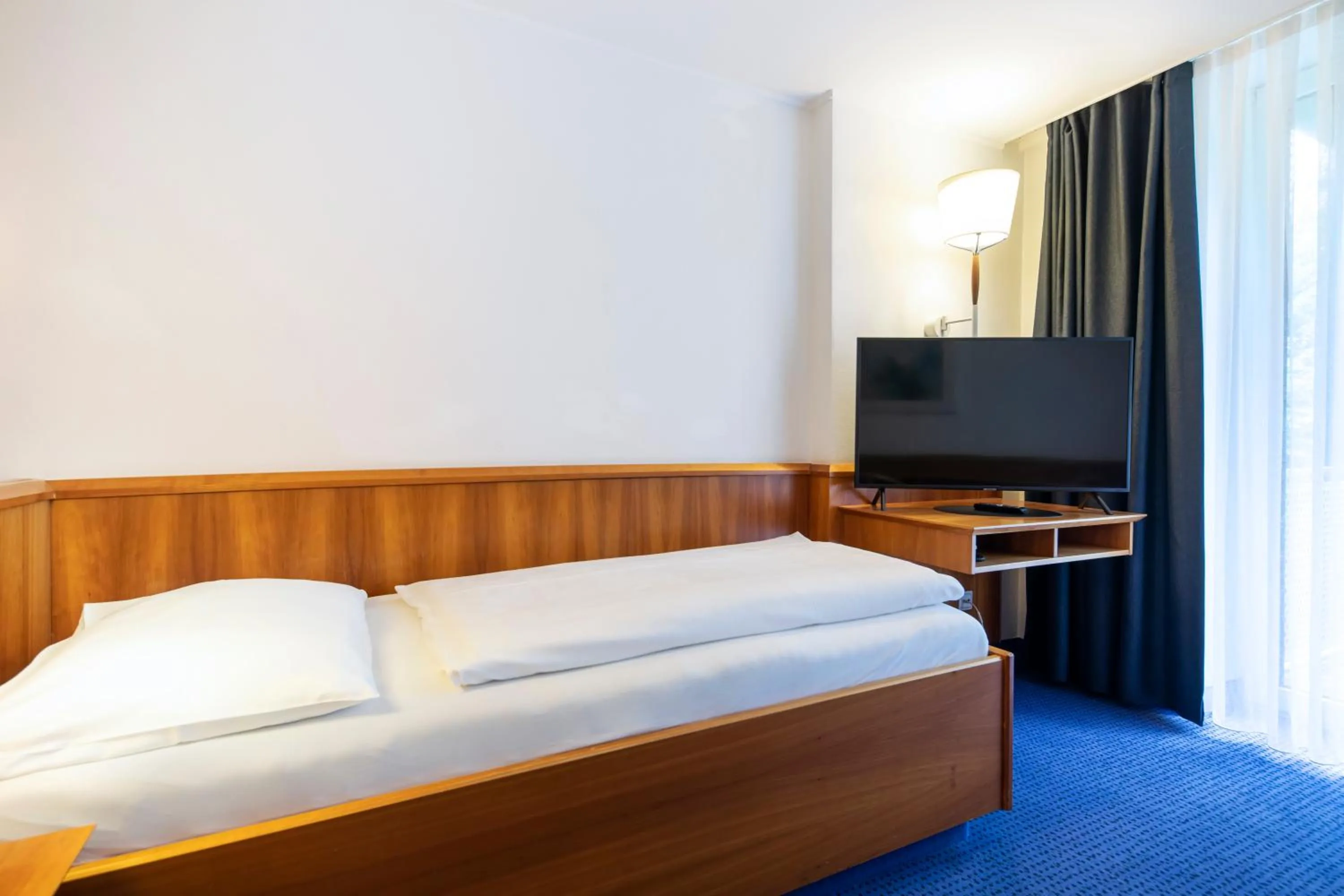 Bedroom, Bed in Karoli Hotel Waldkirchen