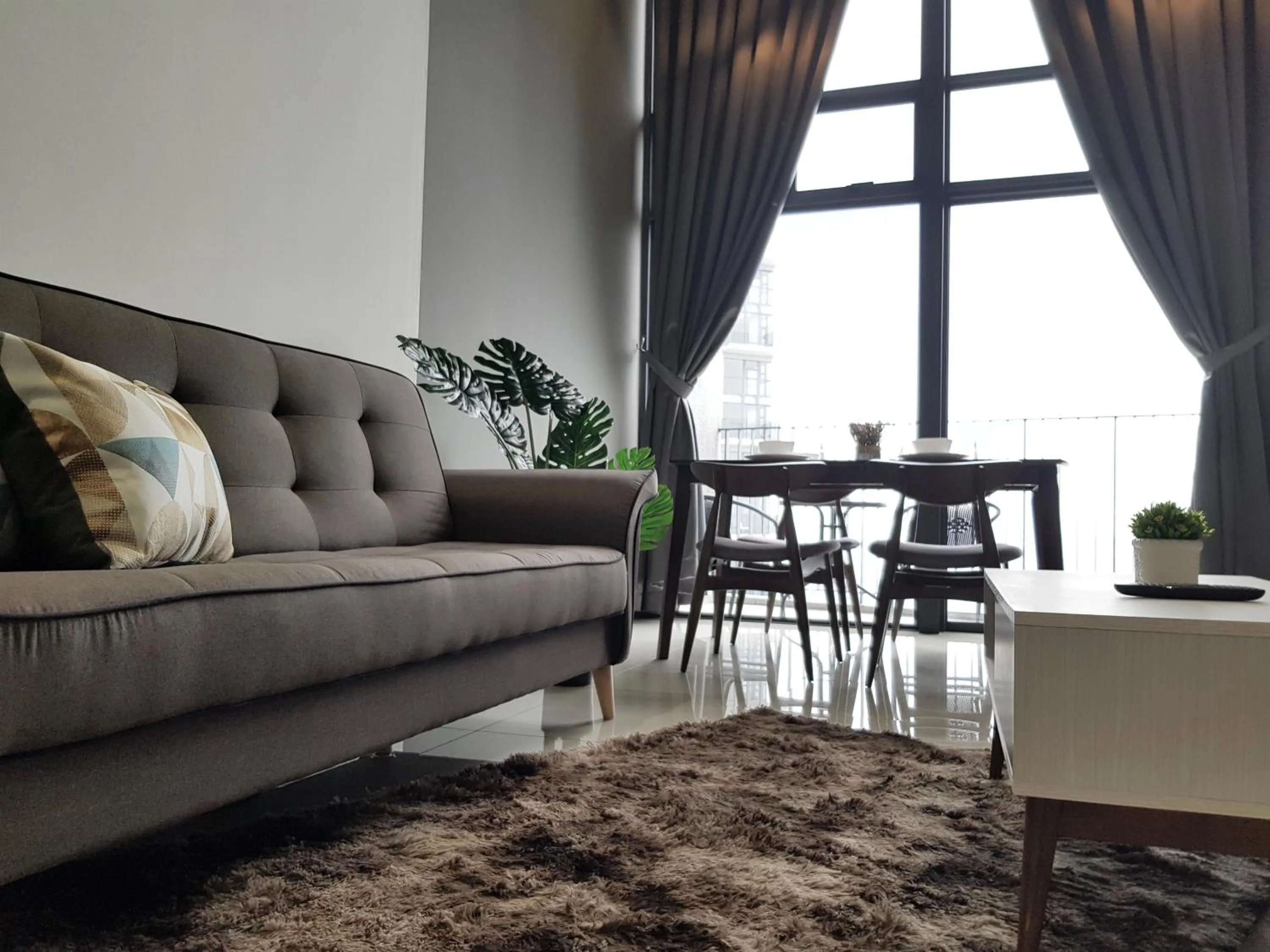 Living room in Ekocheras Suite by MOKA at CHERAS