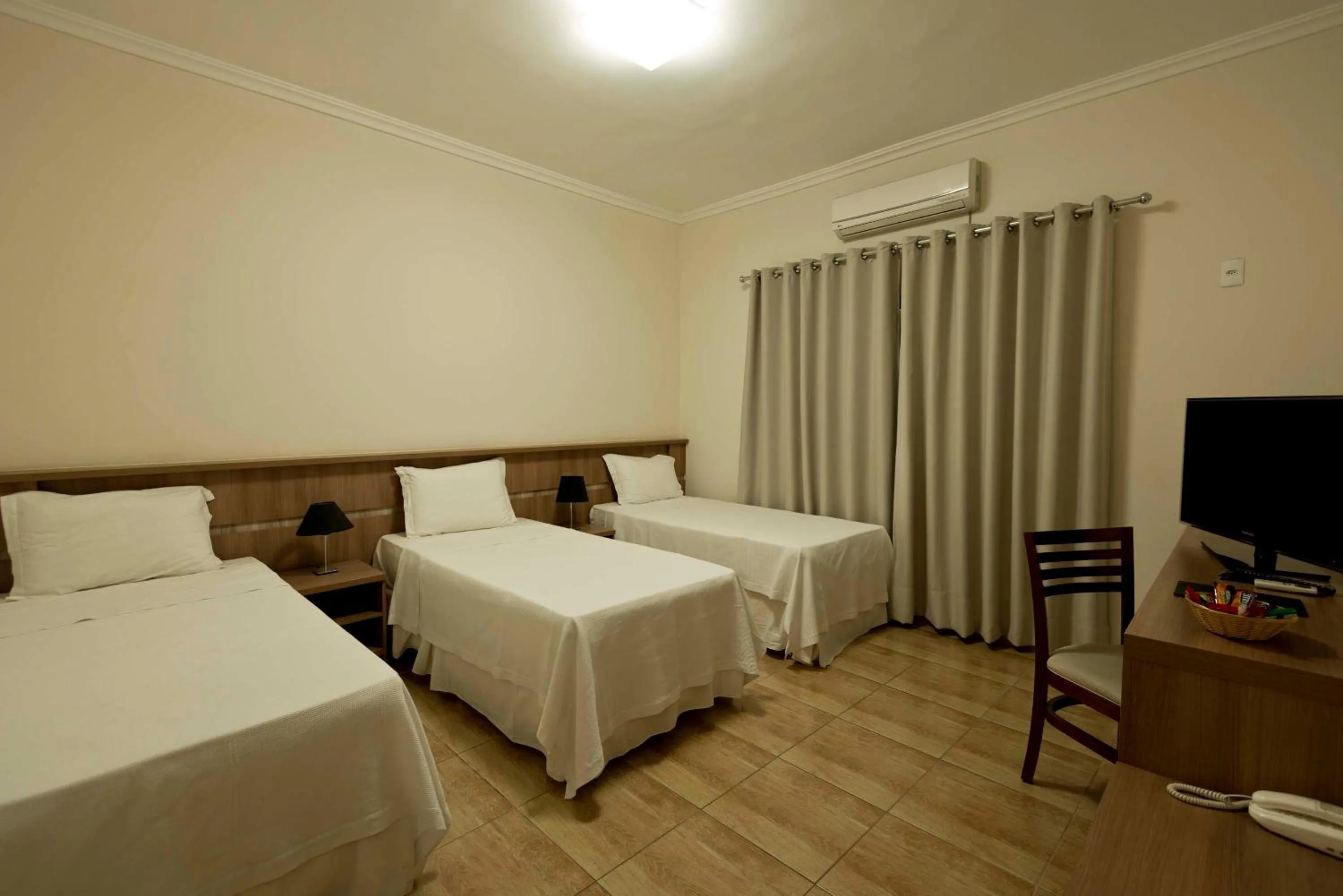 Photo of the whole room, Bed in Grand Enio Hotel e Cantina