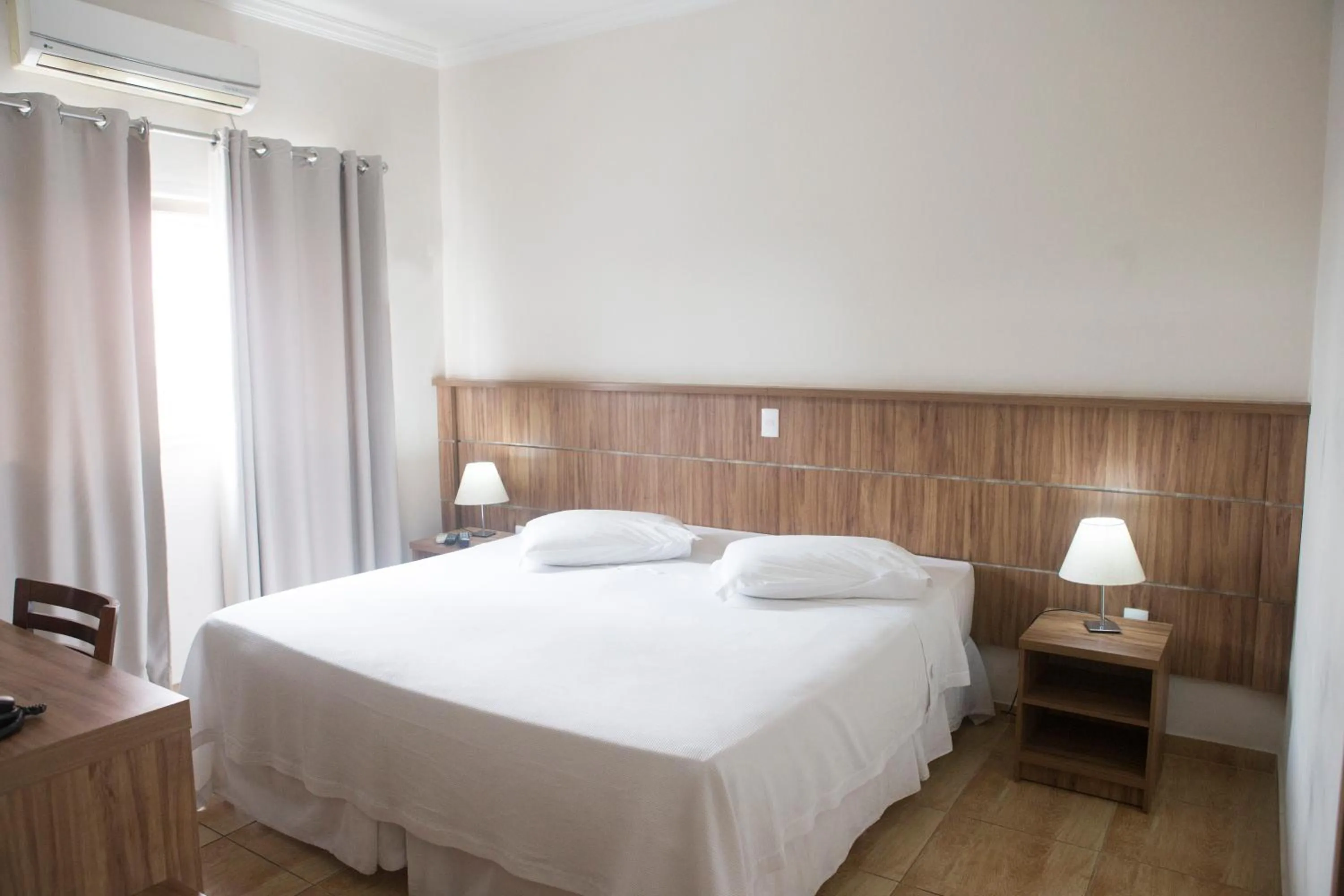 Bed in Grand Enio Hotel e Cantina