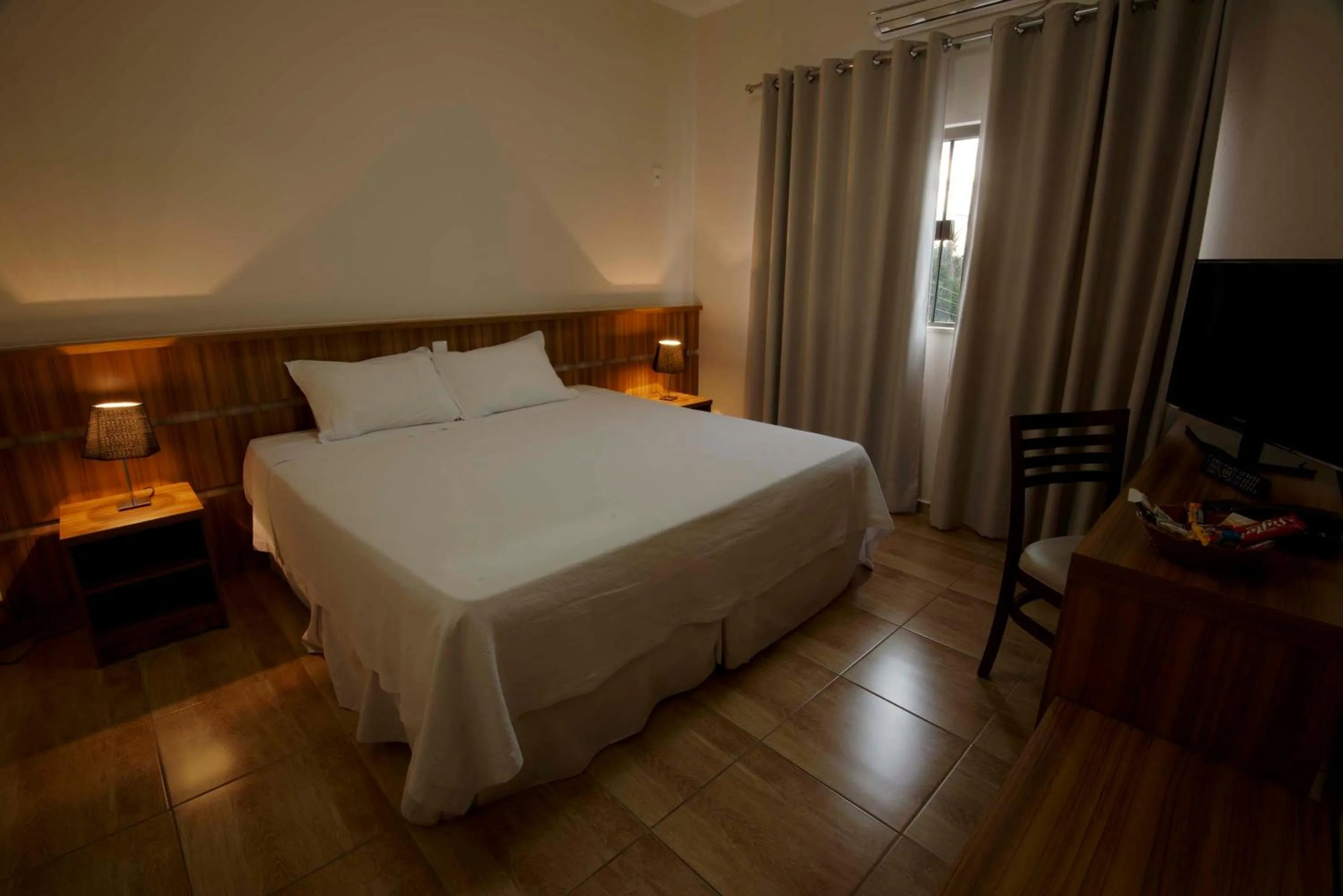 Photo of the whole room, Bed in Grand Enio Hotel e Cantina