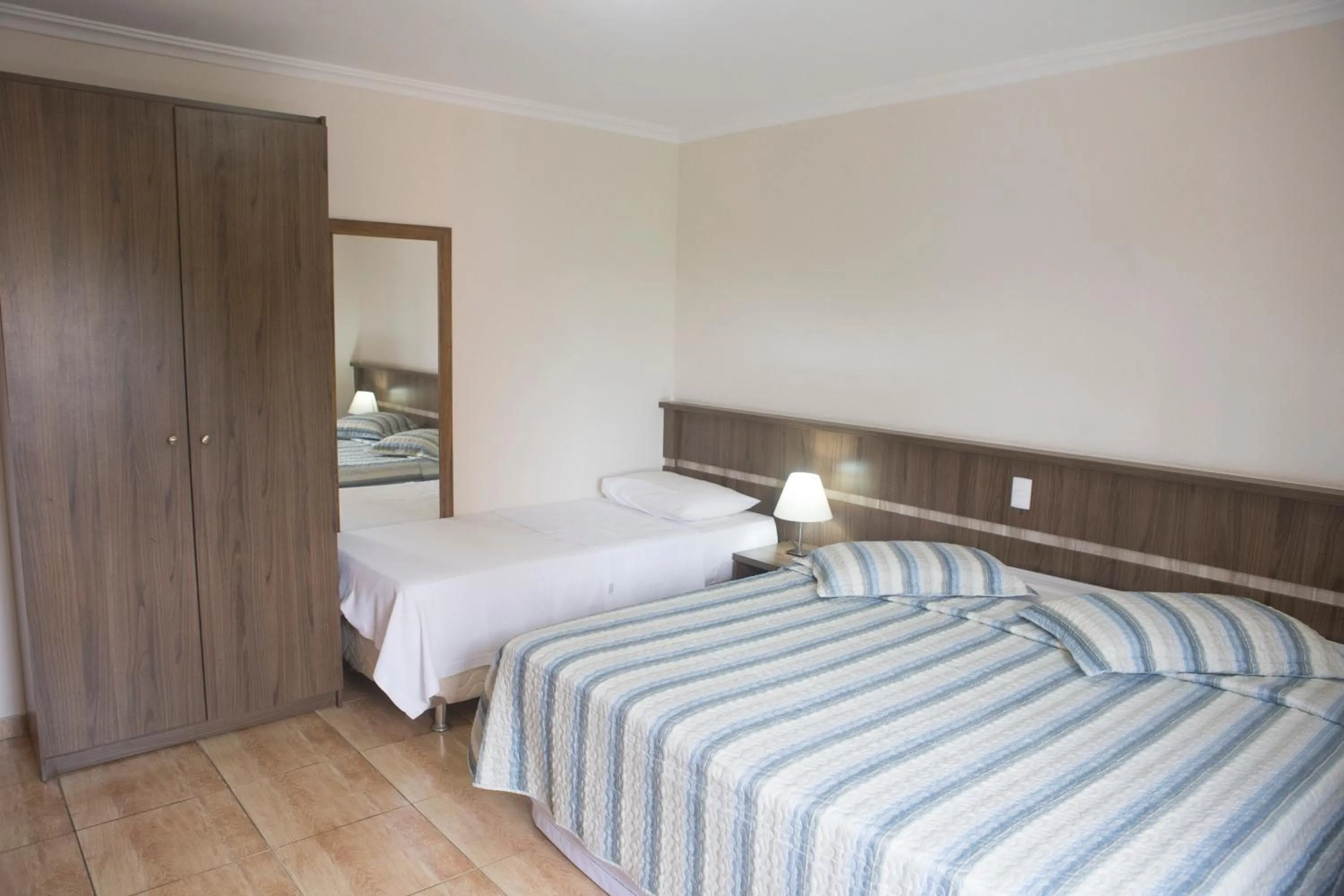 Bed in Grand Enio Hotel e Cantina