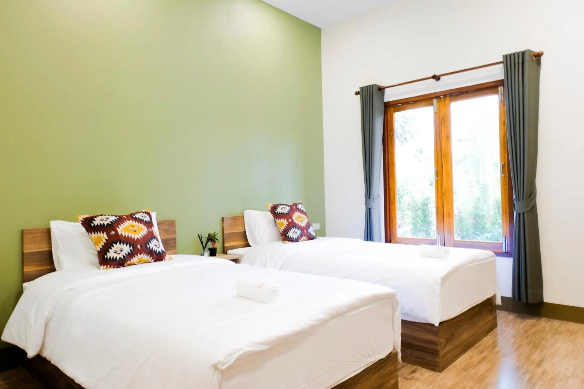 Bed in The Cozy Hotel