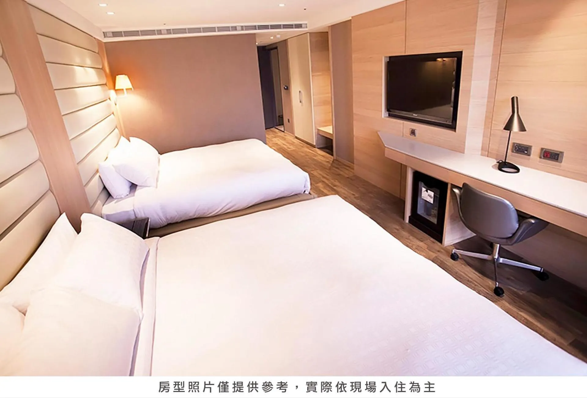 Bed in Royal Group Hotel Minghua Branch