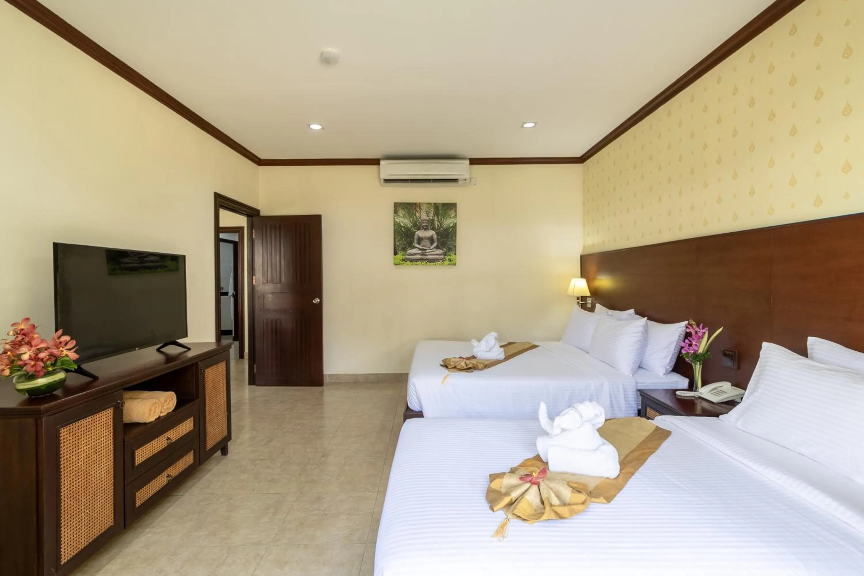 Bed in Thai Garden Resort