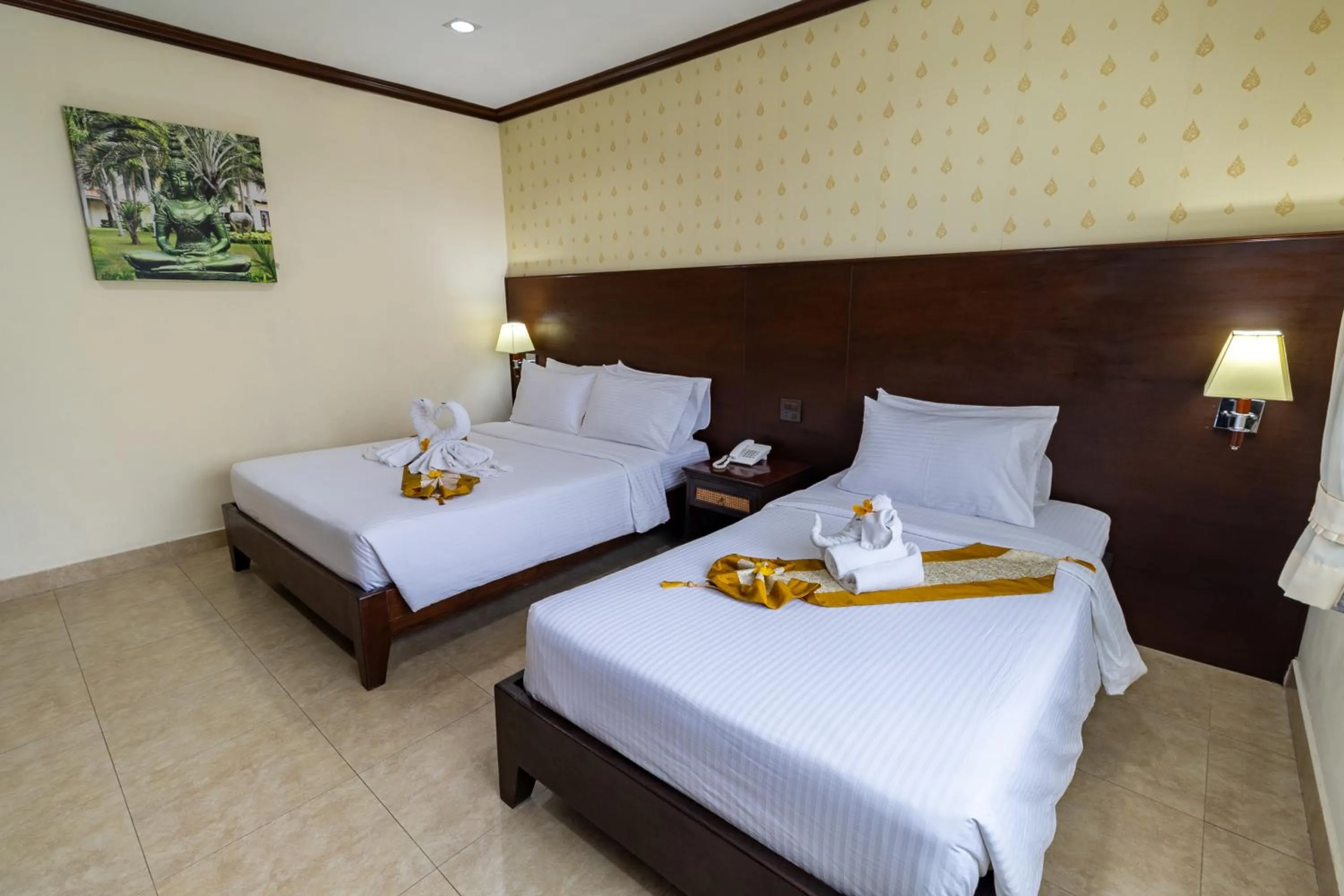 Bed in Thai Garden Resort