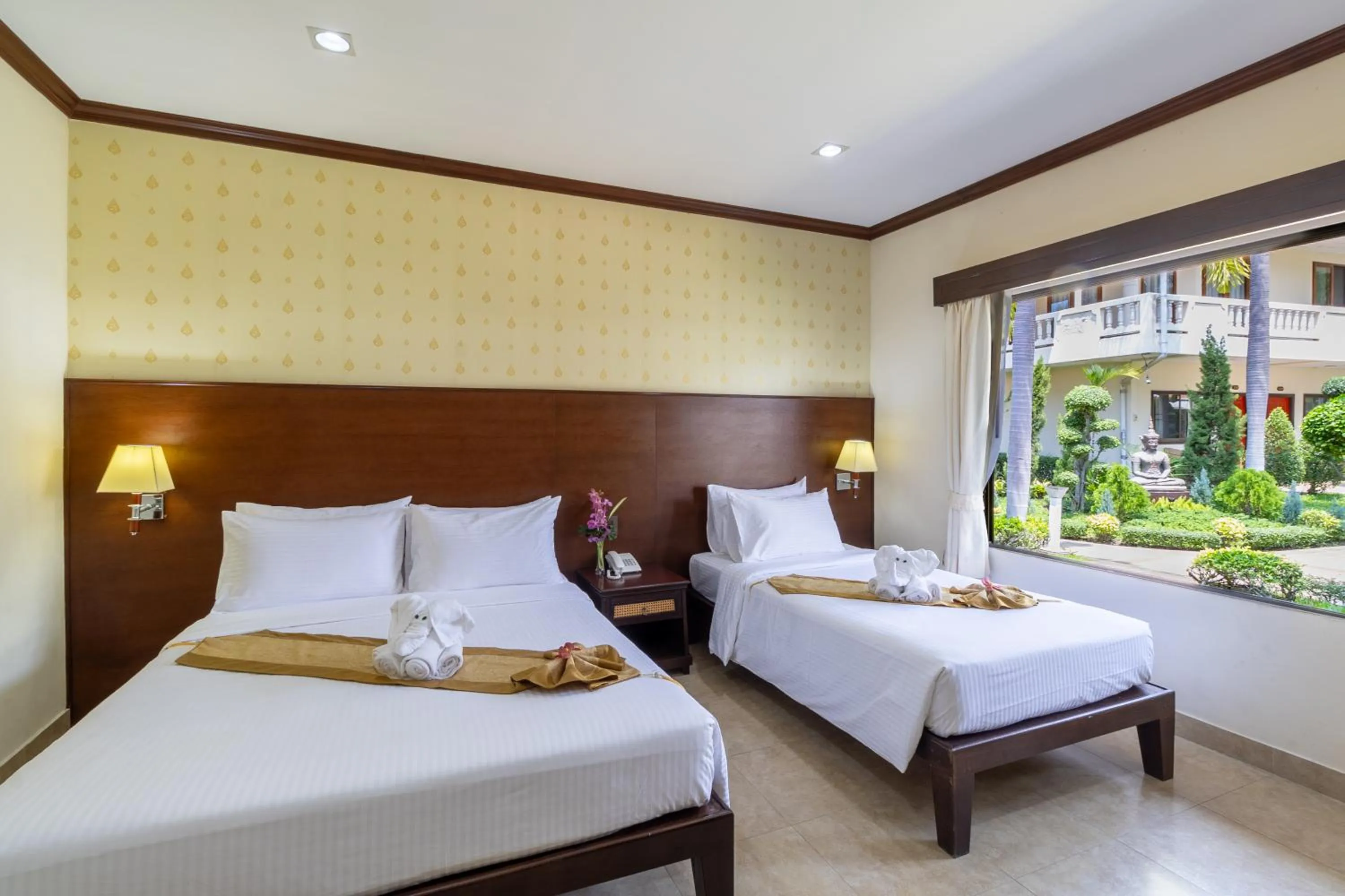 Bed in Thai Garden Resort