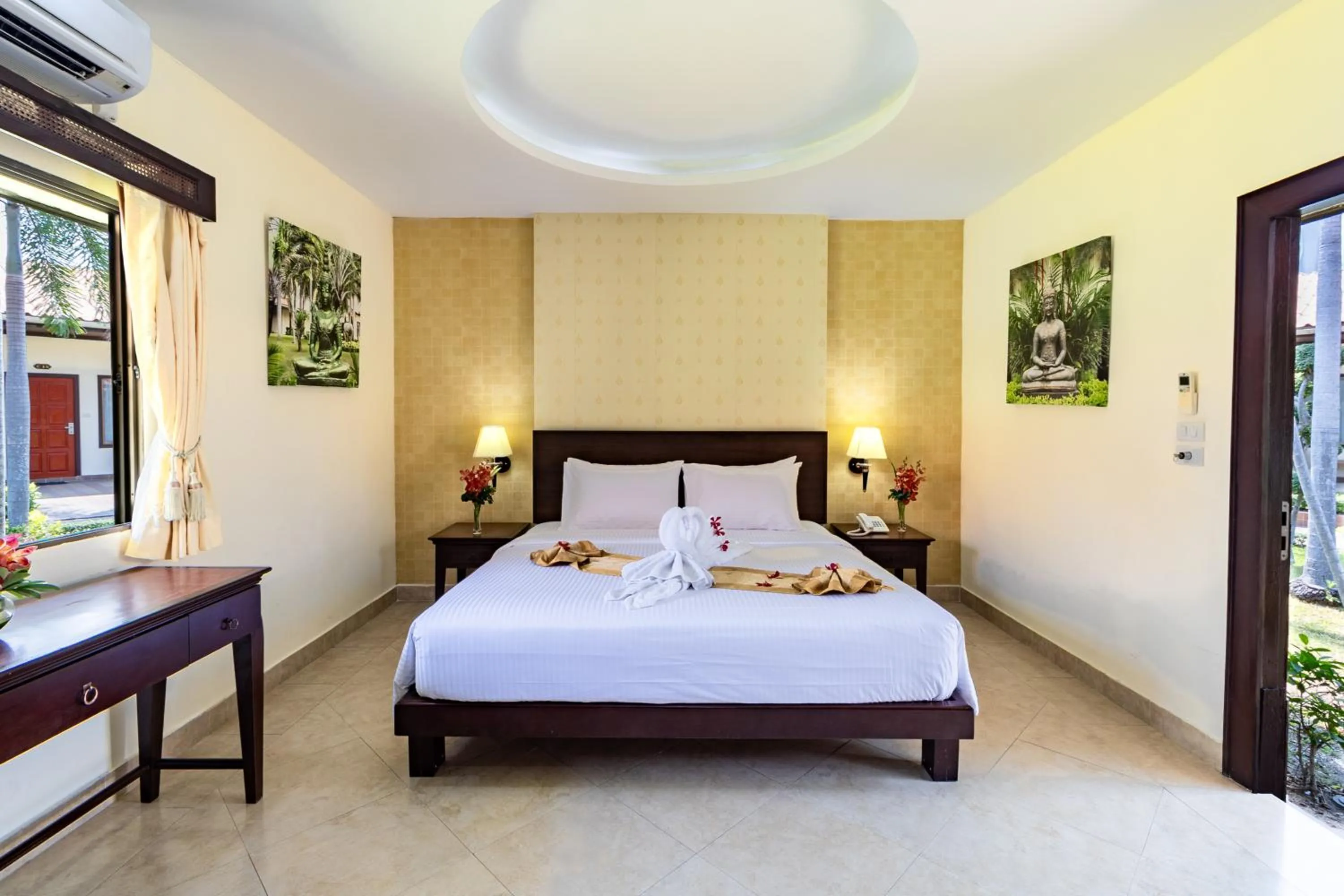 Bed in Thai Garden Resort