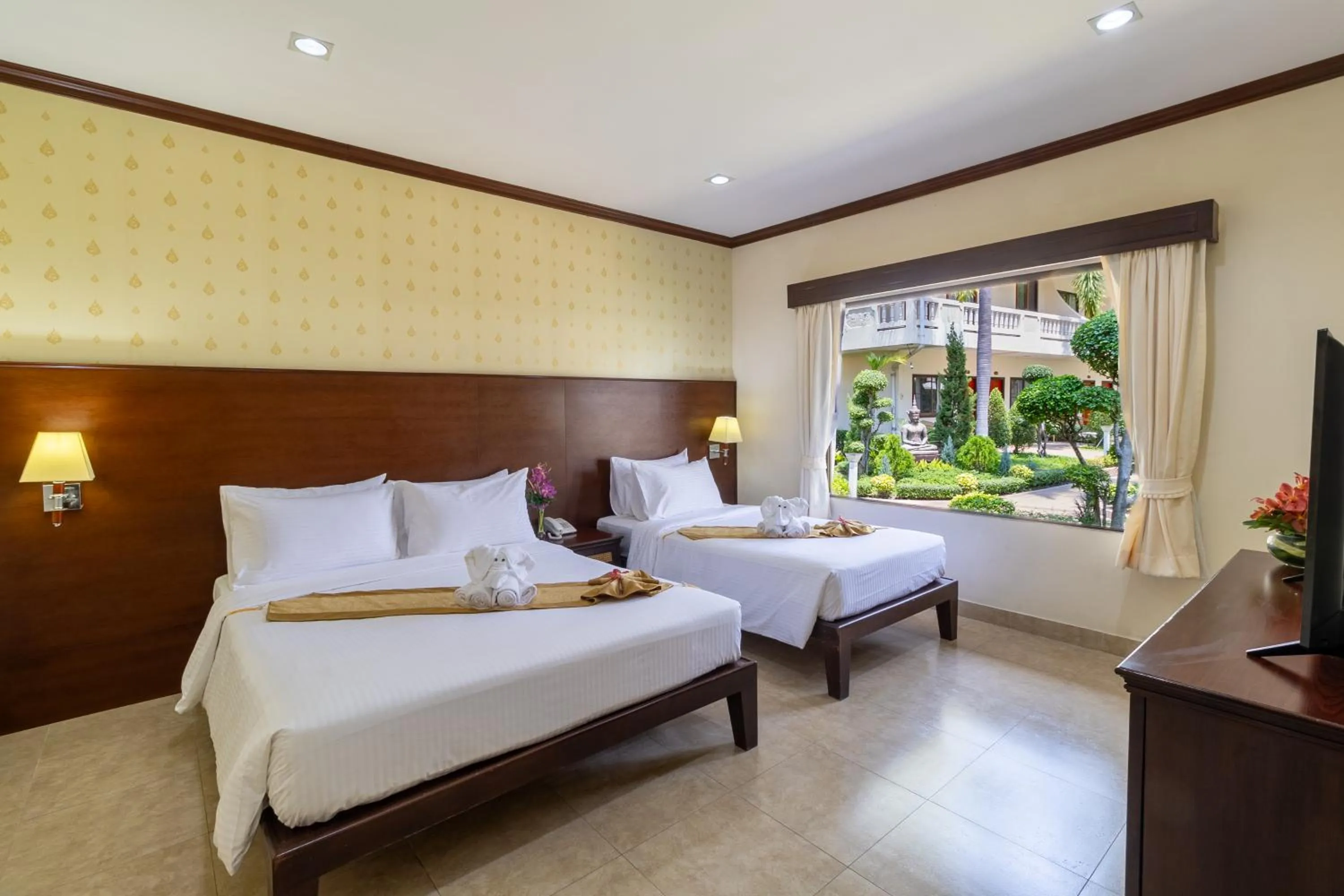 Bed in Thai Garden Resort