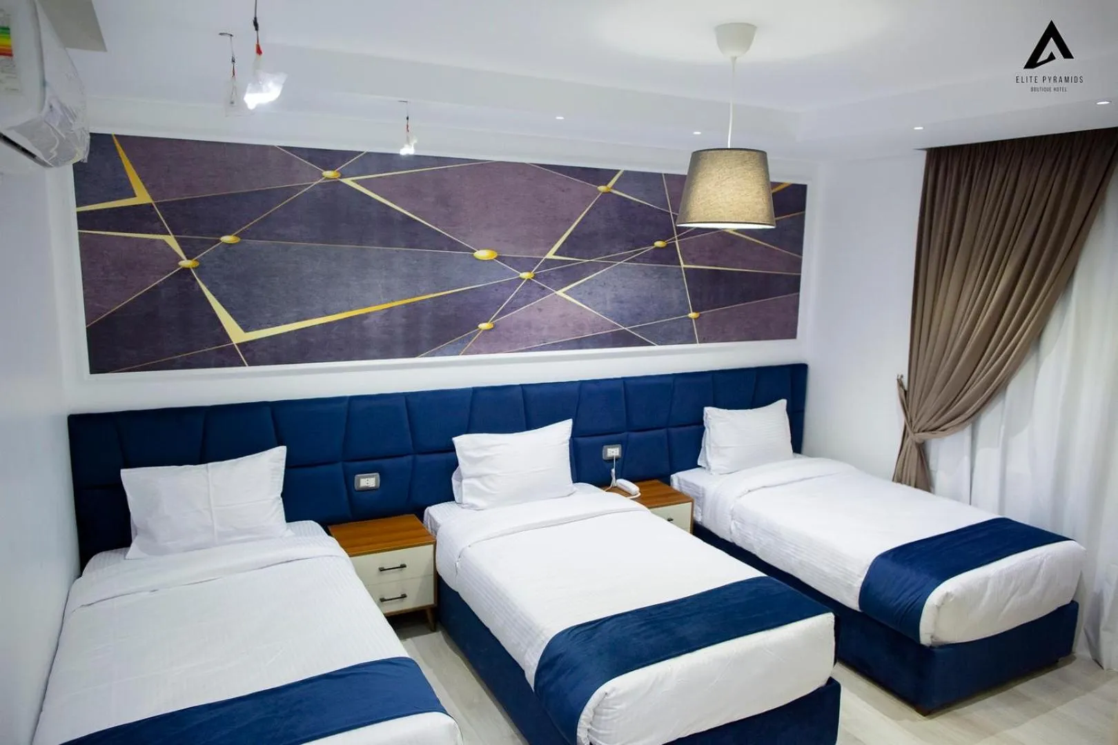 Bed in Elite Pyramids Boutique Hotel