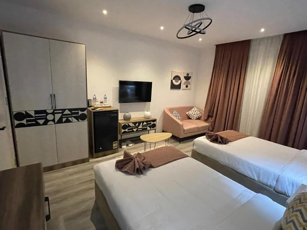 Communal lounge/ TV room, Bed in Elite Pyramids Boutique Hotel